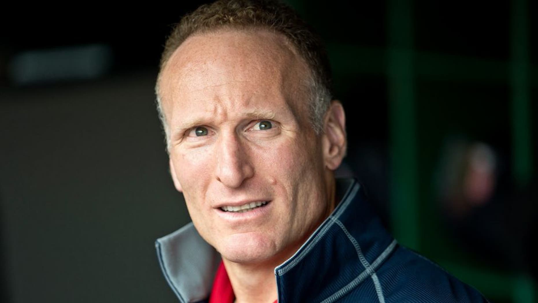 CLEVELAND, OH - JULY 10: President of the Cleveland Indians Mark Shapiro in the dugout prior to the game against the Toronto Blue Jays at Progressive Field on July 10, 2013 in Cleveland, Ohio. (Photo by Jason Miller/Getty Images)