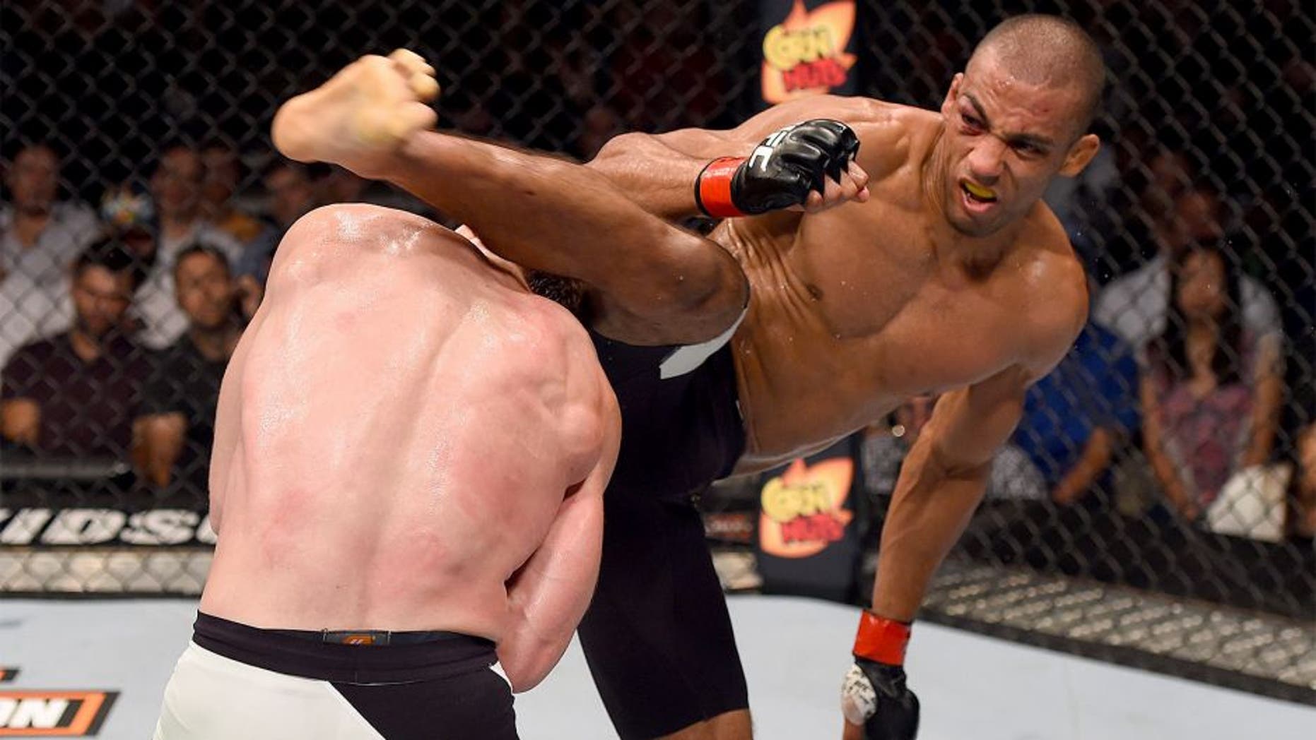 CHICAGO, IL - JULY 25: (R-L) Edson Barboza of Brazil kicks Paul Felder in their lightweight bout during the UFC event at the United Center on July 25, 2015 in Chicago, Illinois. (Photo by Jeff Bottari/Zuffa LLC/Zuffa LLC via Getty Images)