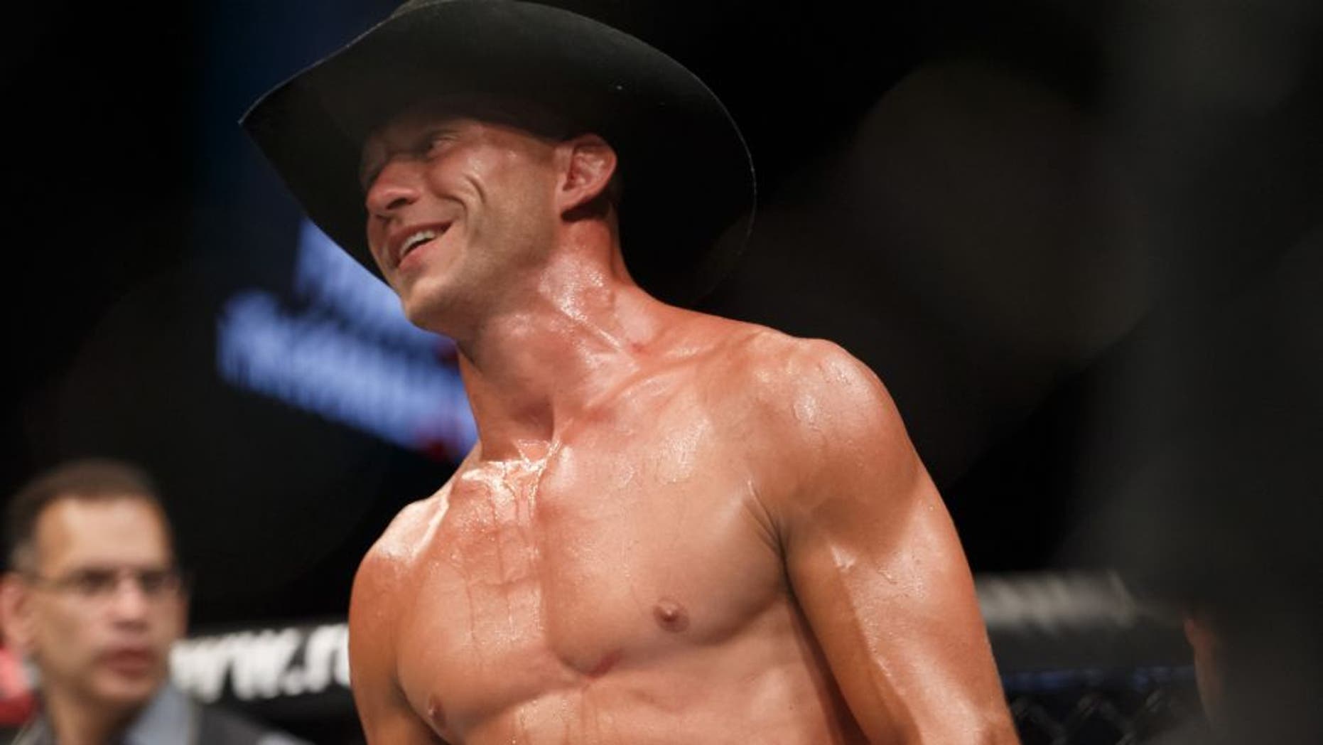OTTAWA, ON - JUNE 18: Donald Cerrone competes against Patrick Cote in their welterweight bout during the UFC Fight Night event inside the TD Place Arena on June 18, 2016 in Ottawa, Ontario, Canada. (Photo by Andre Ringuette/Zuffa LLC/Zuffa LLC via Getty Images)