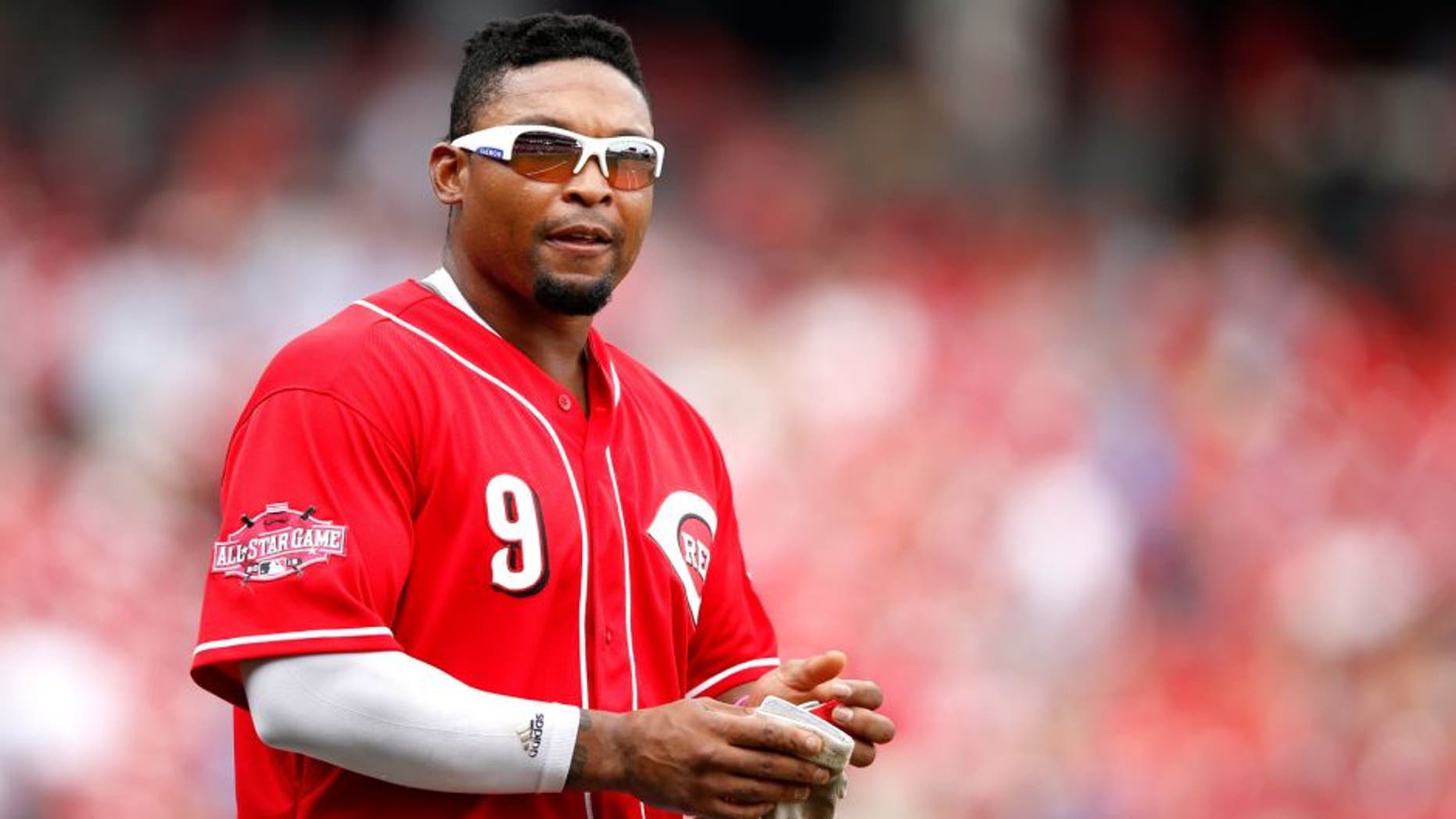 CINCINNATI, OH - JULY 1: Marlon Byrd #9 of the Cincinnati Reds looks on during the game against the Minnesota Twins at Great American Ball Park on July 1, 2015 in Cincinnati, Ohio. The Reds defeated the Twins 2-1. (Photo by Joe Robbins/Getty Images)