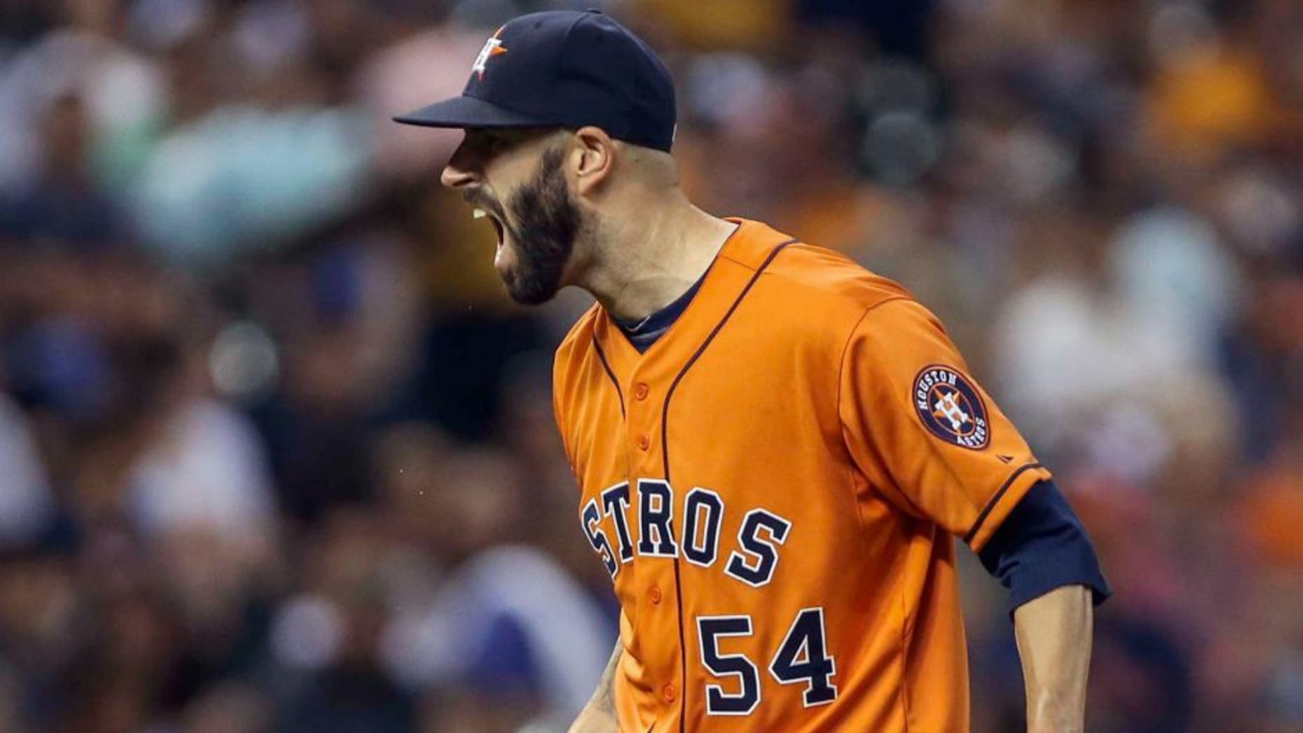 Aug 21, 2015; Houston, TX, USA; Houston Astros starting pitcher Mike Fiers (54) reacts after getting a strikeout during the seventh inning against the Los Angeles Dodgers at Minute Maid Park. Mandatory Credit: Troy Taormina-USA TODAY Sports