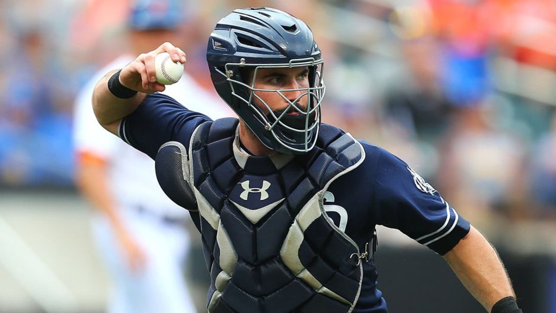 NEW YORK, NY - JULY 30: Austin Hedges #18 of the San Diego Padres in action against the New York Mets at Citi Field on July 30, 2015 in Flushing neighborhood of the Queens borough of New York City. Padres defeated the Mets 8-7. (Photo by Mike Stobe/Getty Images)