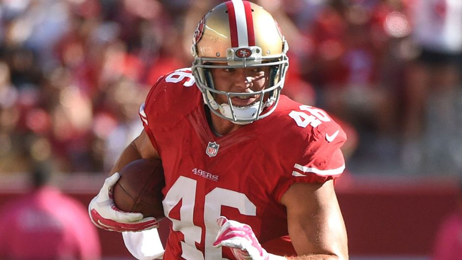October 5, 2014; Santa Clara, CA, USA; San Francisco 49ers tight end Derek Carrier (46) runs with the football during the fourth quarter against the Kansas City Chiefs at Levi's Stadium. The 49ers defeated the Chiefs 22-17. Mandatory Credit: Kyle Terada-USA TODAY Sports