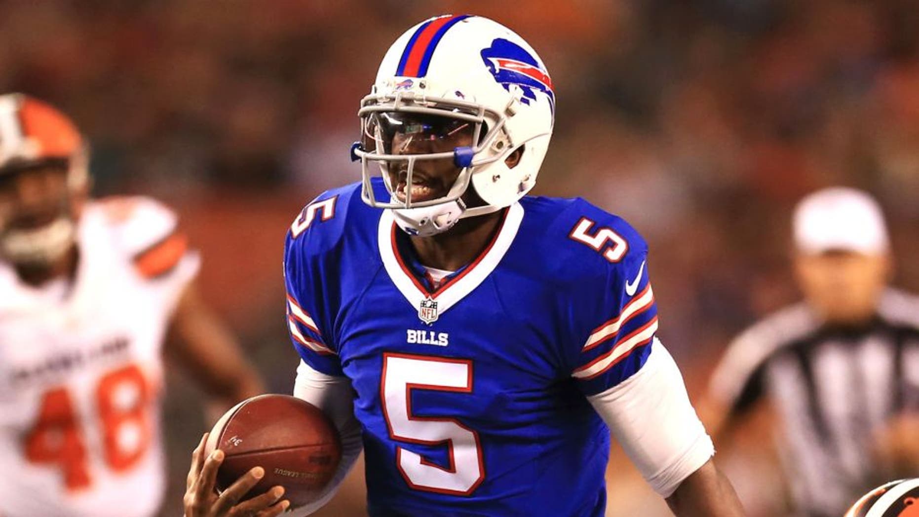 Aug 20, 2015; Cleveland, OH, USA; Buffalo Bills quarterback Tyrod Taylor (5) runs the ball during the second quarter of a preseason game against the Cleveland Browns at FirstEnergy Stadium. Mandatory Credit: Andrew Weber-USA TODAY Sports
