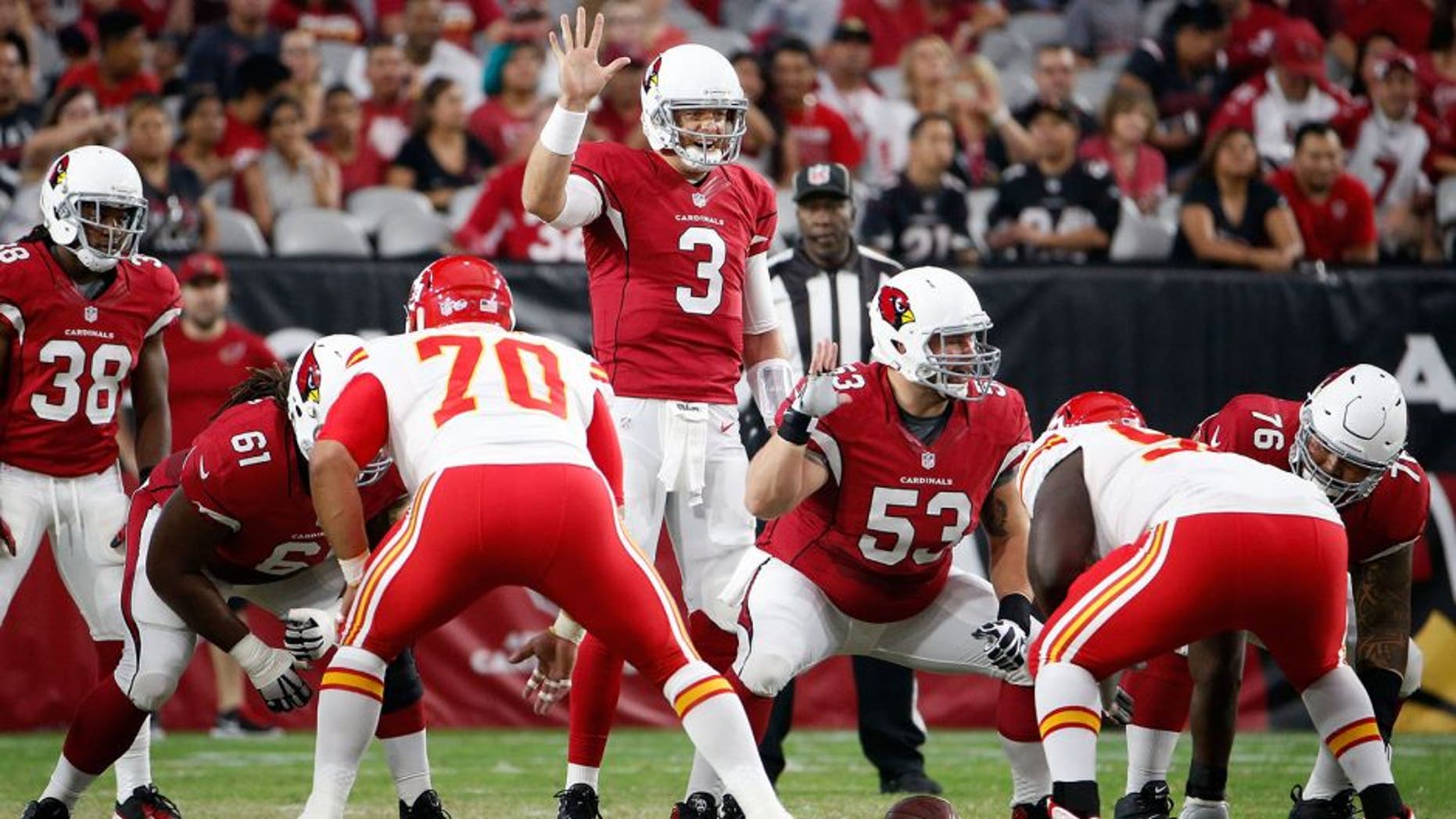 GLENDALE, AZ - AUGUST 15: Quarterback Carson Palmer #3 of the Arizona Cardinals prepares to snap the football during the pre-season NFL game against the Kansas City Chiefs at the University of Phoenix Stadium on August 15, 2015 in Glendale, Arizona. (Photo by Christian Petersen/Getty Images)