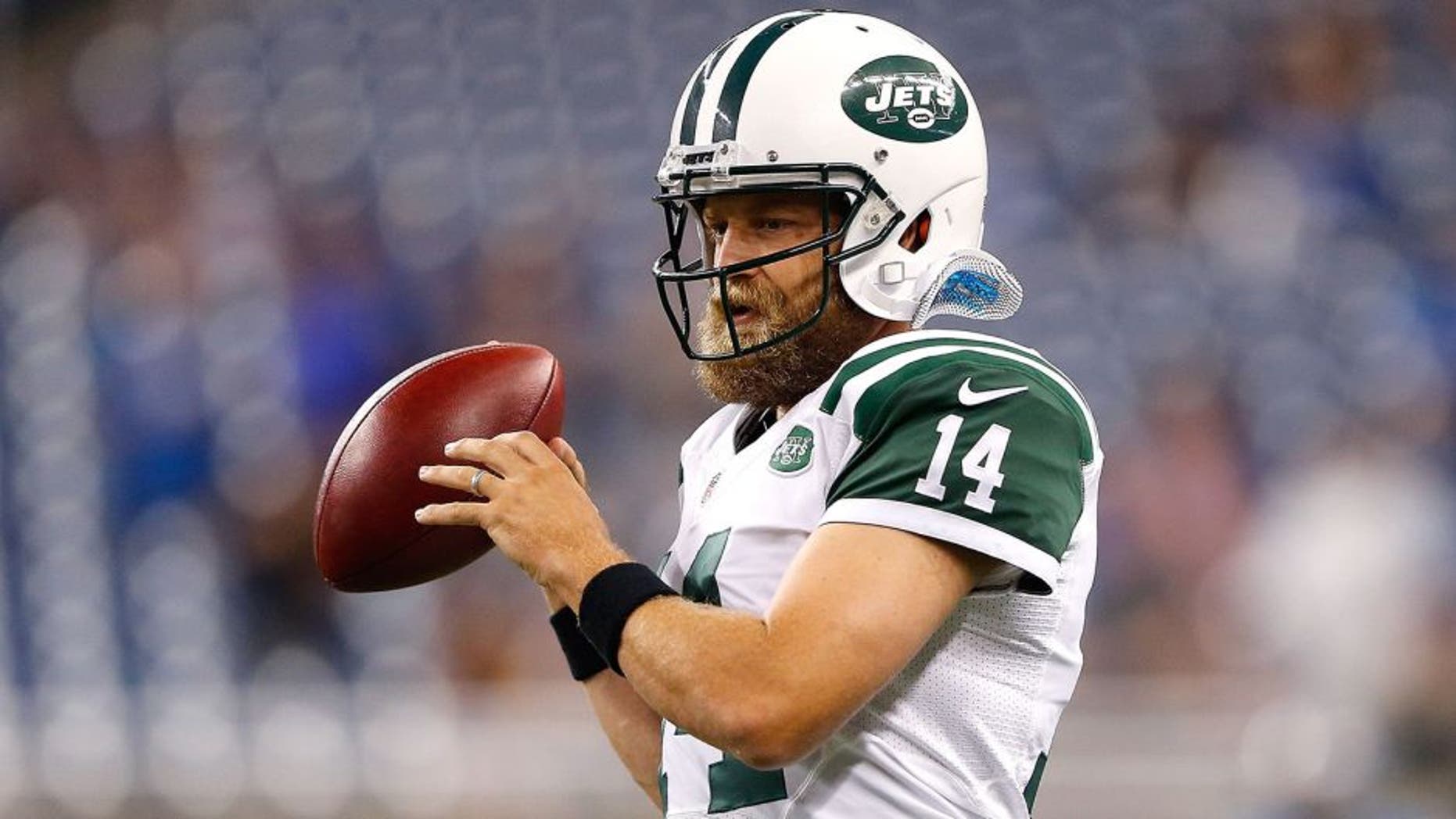 DETROIT, MI - AUGUST 13: Ryan Fitzpatrick #14 of the New York Jets warms up prior to the start of the preseason game against the Detroit Lions on August 13, 2015 at Ford Field Detroit, Michigan. The Lions defeated the Jets 23-3. (Photo by Leon Halip/Getty Images)