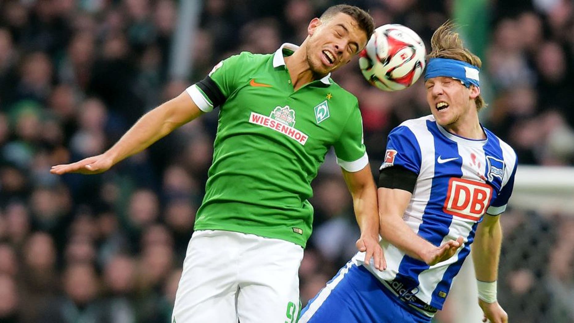 BREMEN, GERMANY - FEBRUARY 01: Franco Di Santo of Werder Bremen and Peter Niemeyer of Hertha BSC go up for a header during the game between Werder Bremen and Hertha BSC on february 1, 2015 in Bremen, Germany. (Photo by Marco Leipold/City-Press via Getty Images)