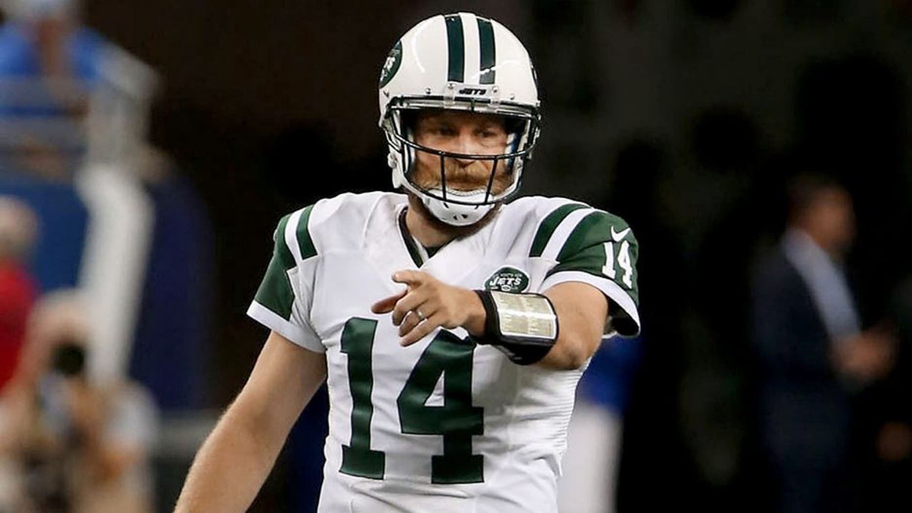 DETROIT, MI - AUGUST 13: Quarterback Ryan Fitzpatrick #14 of the New York Jets calls a play against the Detroit Lions at Ford Field on August 13, 2015 in Detroit, Michigan. (Photo by Al Pereira/Getty Images for New York Jets)