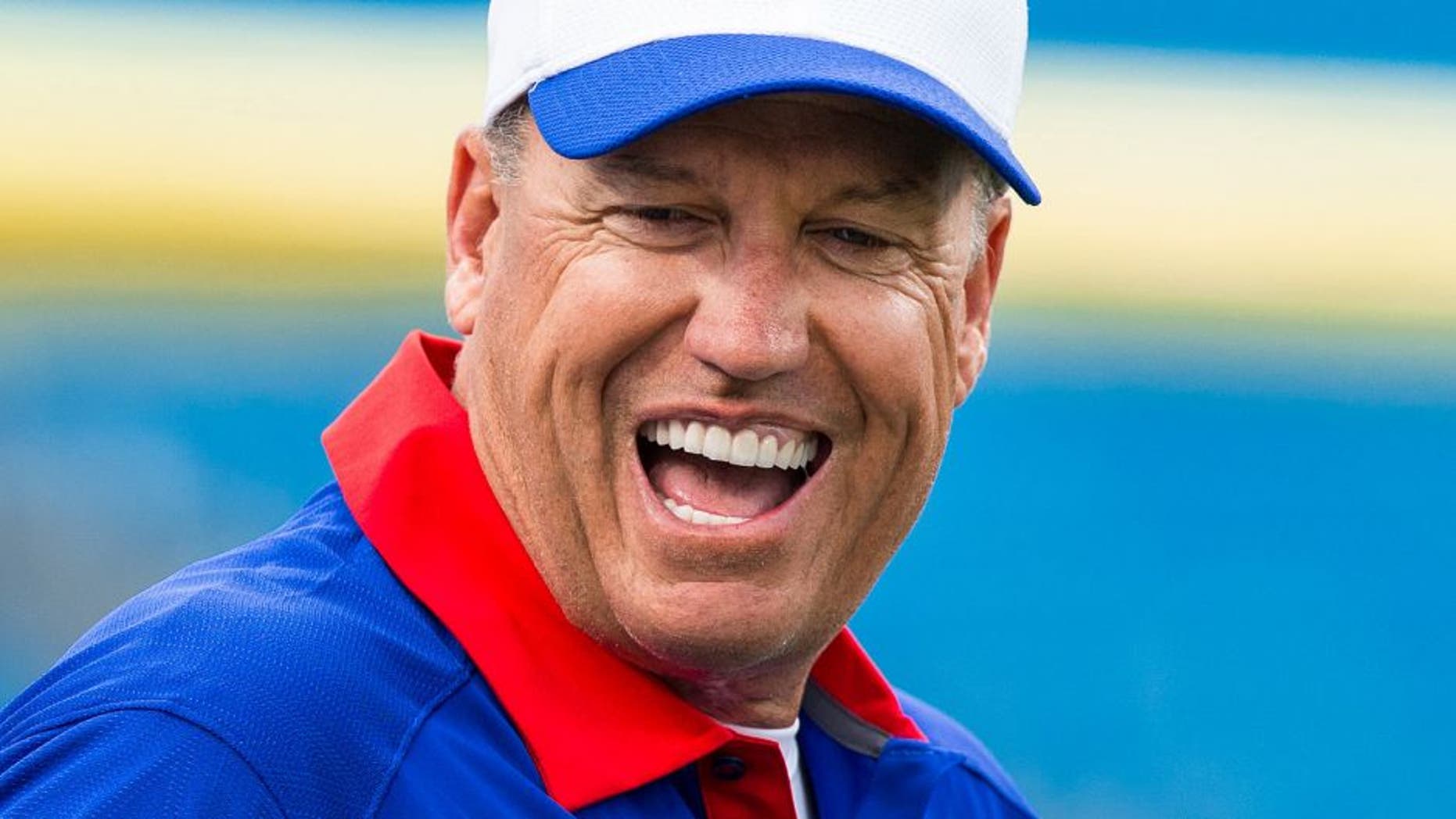 ORCHARD PARK, NY - AUGUST 14: Head coach Rex Ryan of the Buffalo Bills laughs with players before the game against the Carolina Panthers on August 14, 2015 at Ralph Wilson Stadium in Orchard Park, New York. (Photo by Brett Carlsen/Getty Images)