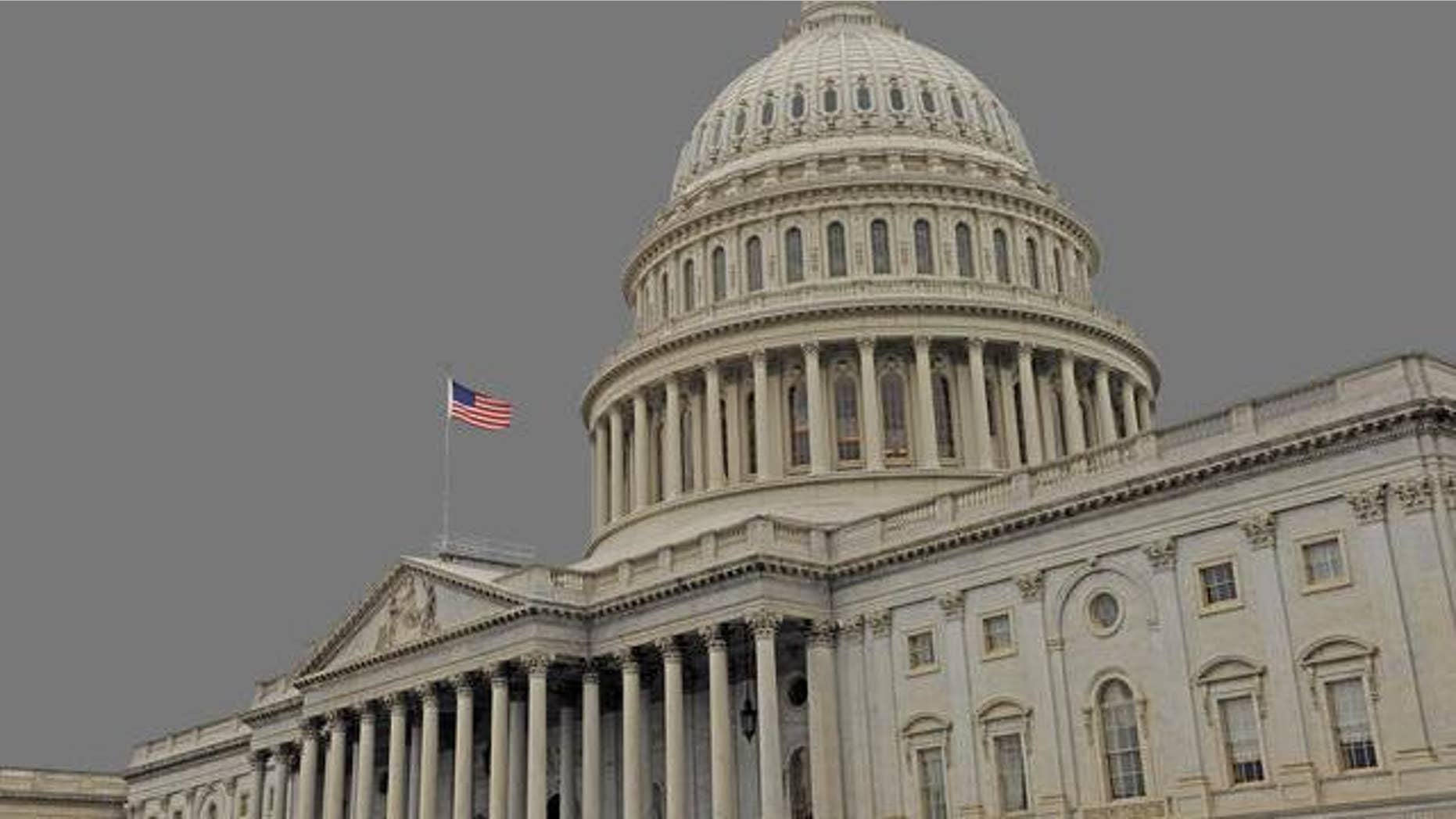 As Americans vote this Election Day, the United States Capitol is seen in Washington, Tuesday, Nov. 4, 2008. (AP Photo/Susan Walsh)