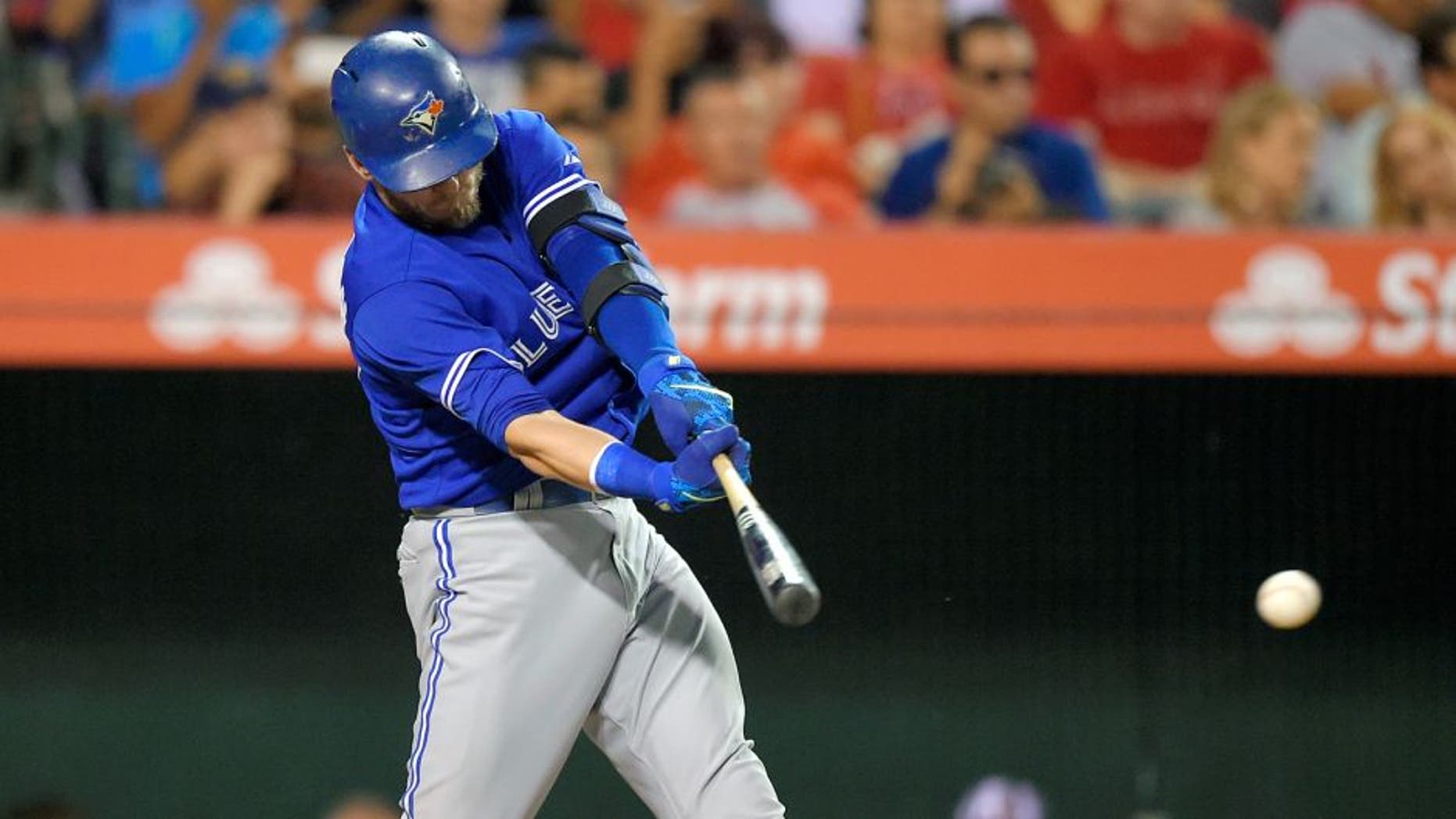 Toronto Blue Jays' Josh Donaldson hits an RBI single during the fourth inning of a baseball game against the Los Angeles Angels, Saturday, Aug. 22, 2015, in Anaheim, Calif. (AP Photo/Mark J. Terrill)