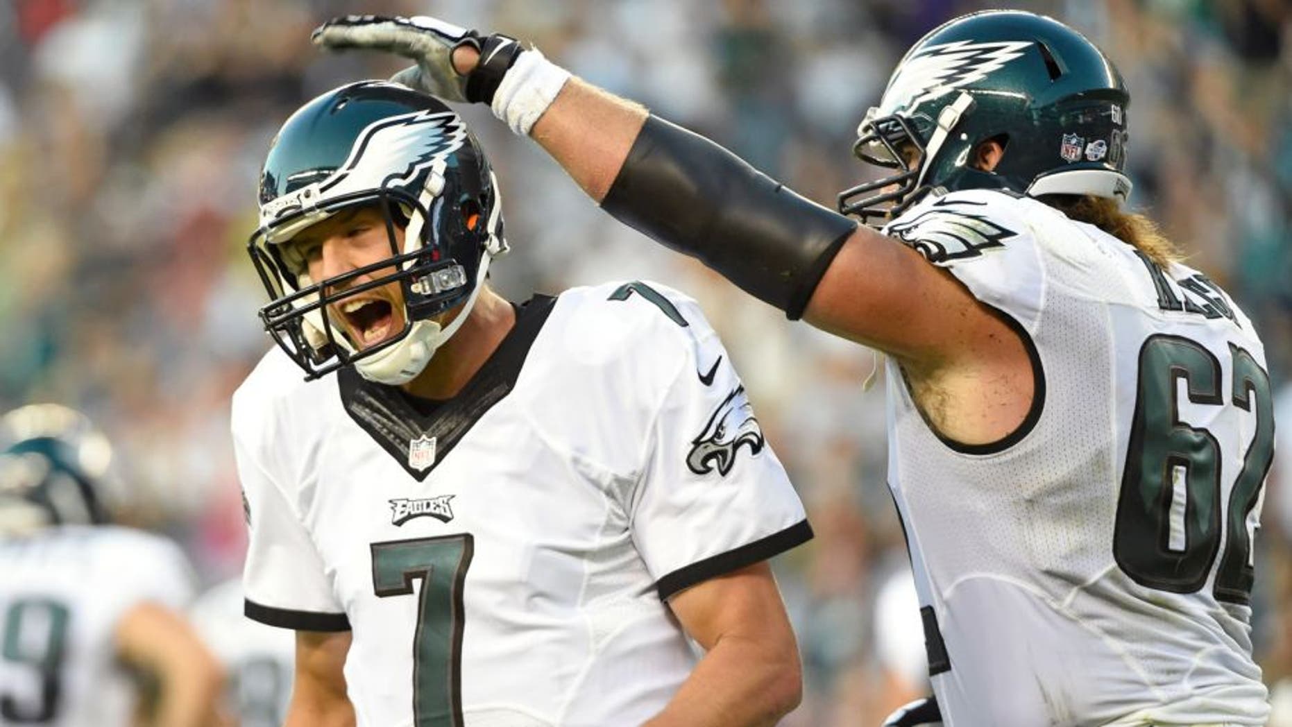 Aug 22, 2015; Philadelphia, PA, USA; Philadelphia Eagles quarterback Sam Bradford (7) celebrates a touchdown with center Jason Kelce (62) against the Baltimore Ravens during the first quarter at Lincoln Financial Field. Mandatory Credit: Eric Hartline-USA TODAY Sports