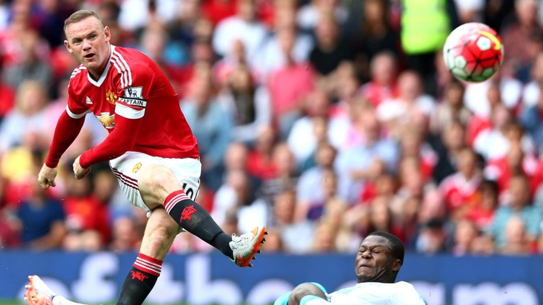 MANCHESTER, ENGLAND - AUGUST 22: Wayne Rooney of Manchester United shoots at goal during the Barclays Premier League match between Manchester United and Newcastle United at Old Trafford on August 22, 2015 in Manchester, England. (Photo by Clive Brunskill/Getty Images)