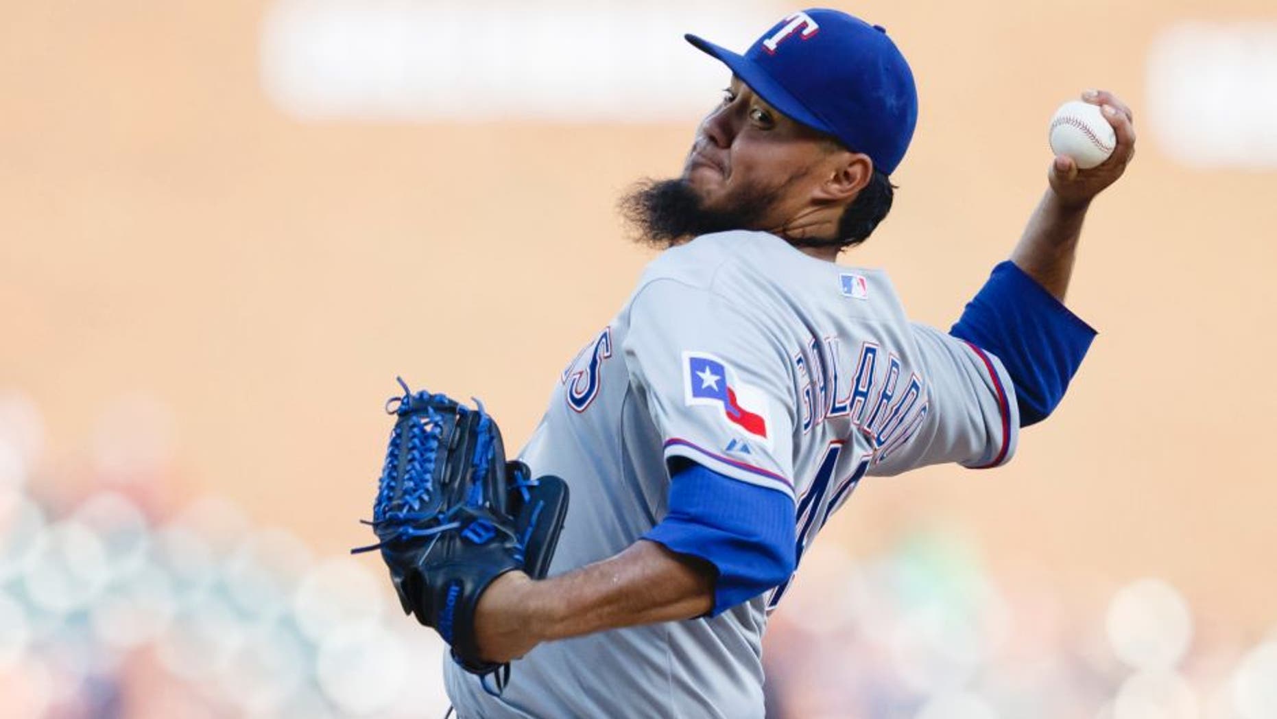 Aug 22, 2015; Detroit, MI, USA; Texas Rangers starting pitcher Yovani Gallardo (49) pitches in the first inning against the Detroit Tigers at Comerica Park. Mandatory Credit: Rick Osentoski-USA TODAY Sports
