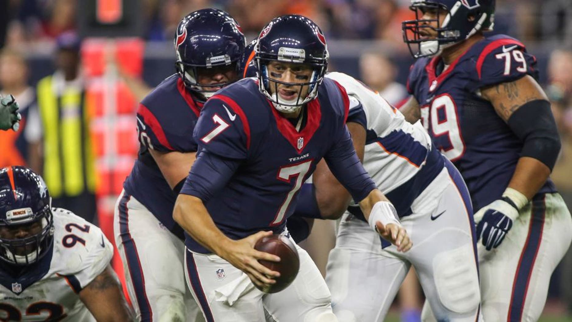 Aug 22, 2015; Houston, TX, USA; Houston Texans quarterback Brian Hoyer (7) scrambles with the ball during the second quarter against the Denver Broncos at NRG Stadium. Mandatory Credit: Troy Taormina-USA TODAY Sports