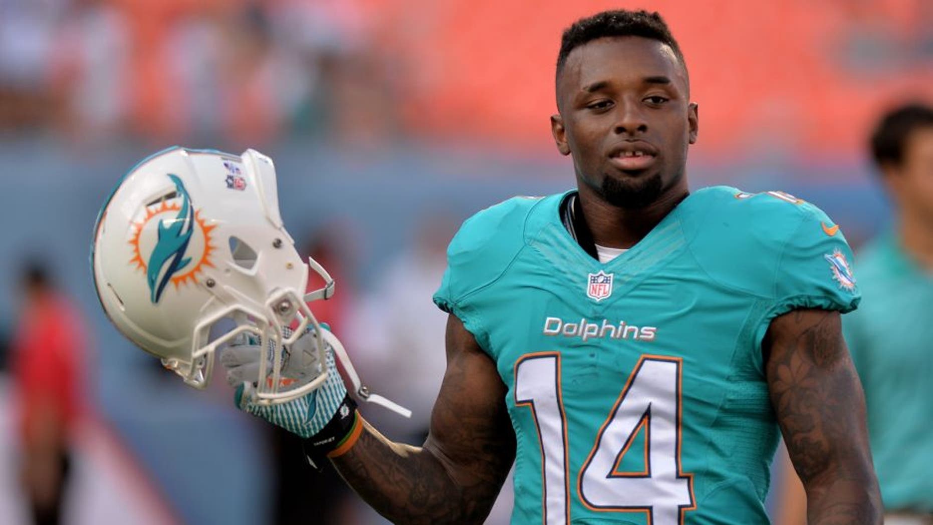 Aug 23, 2014; Miami Gardens, FL, USA; Miami Dolphins wide receiver Jarvis Landry (14) prior to a game against the Dallas Cowboys at Sun Life Stadium. Mandatory Credit: Steve Mitchell-USA TODAY Sports
