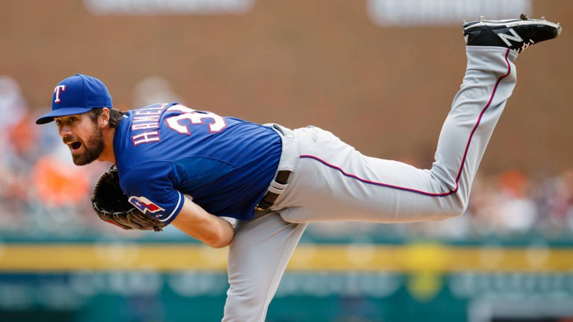 Aug 23, 2015; Detroit, MI, USA; Texas Rangers starting pitcher Cole Hamels (35) pitches in the first inning against the Detroit Tigers at Comerica Park. Mandatory Credit: Rick Osentoski-USA TODAY Sports