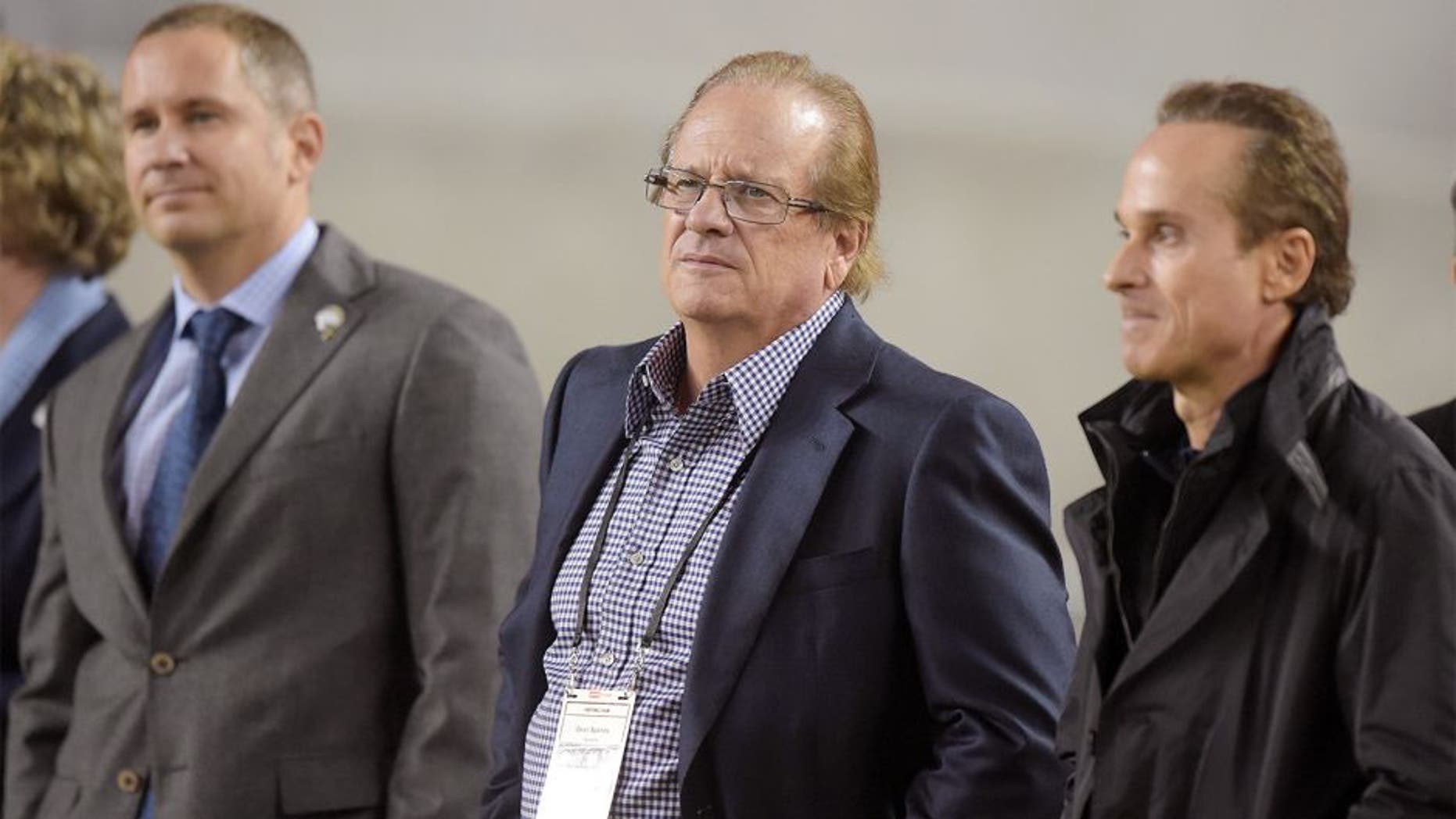 Dec 20, 2014; Santa Clara, CA, USA; San Diego Chargers president Dean Spanos (center) is flanked by chief executive officer A.G. Spanos (left) and executive vice president Michael Spanos during the game against the San Francisco 49ers at Levi's Stadium. Mandatory Credit: Kirby Lee-USA TODAY Sports