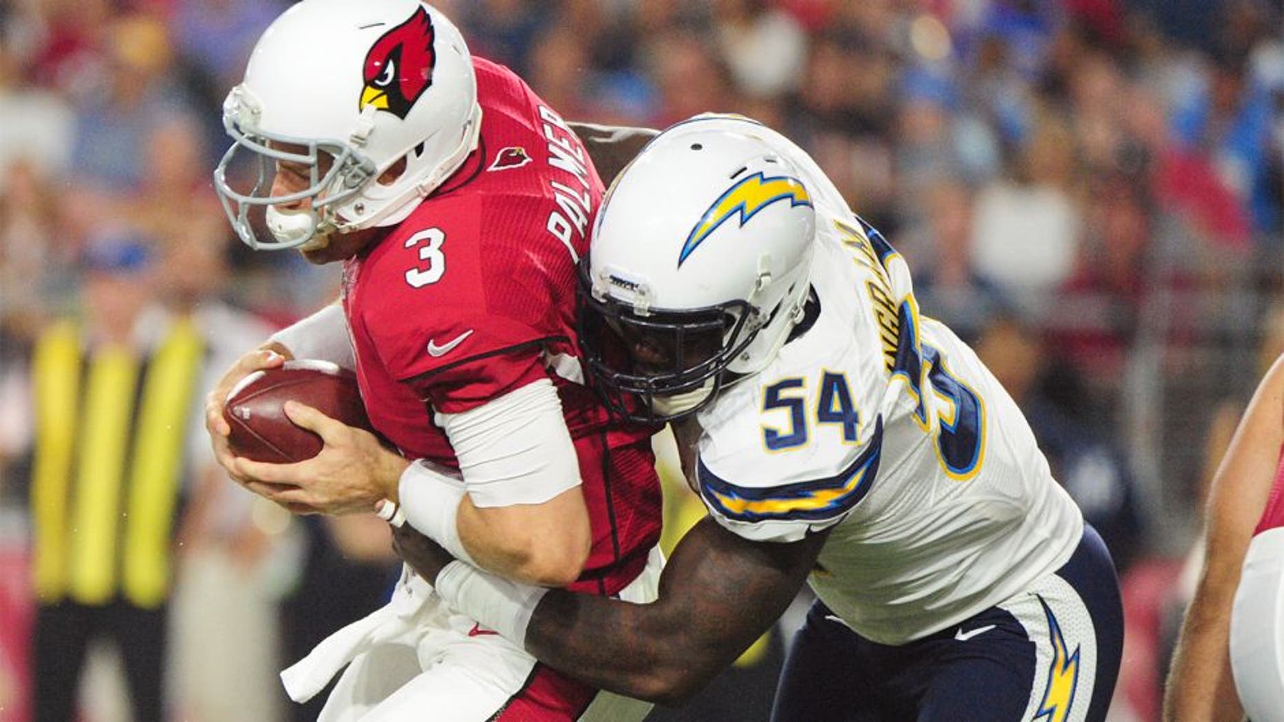 Aug 22, 2015; Glendale, AZ, USA; Arizona Cardinals quarterback Carson Palmer (3) is sacked by San Diego Chargers outside linebacker Melvin Ingram (54) during the first half at University of Phoenix Stadium. Mandatory Credit: Matt Kartozian-USA TODAY Sports