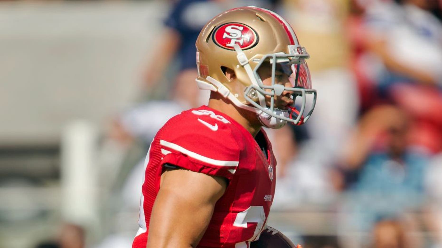 SANTA CLARA, CA - AUGUST 23: Running back Jarryd Hayne #38 of the San Francisco 49ers picks up a step during pregame drills before a preseason game against the Dallas Cowboys on August 23, 2015 at Levi's Stadium in Santa Clara, California. (Photo by Brian Bahr/Getty Images)