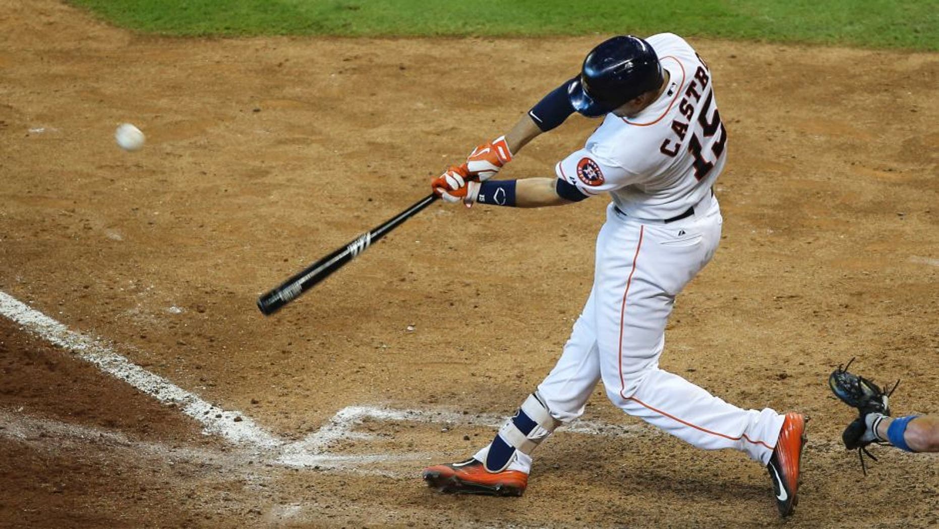 Aug 23, 2015; Houston, TX, USA; Houston Astros catcher Jason Castro (15) hits a game winning walk off home run during the tenth inning against the Los Angeles Dodgers at Minute Maid Park. The Astros defeated the Dodgers 3-2. Mandatory Credit: Troy Taormina-USA TODAY Sports