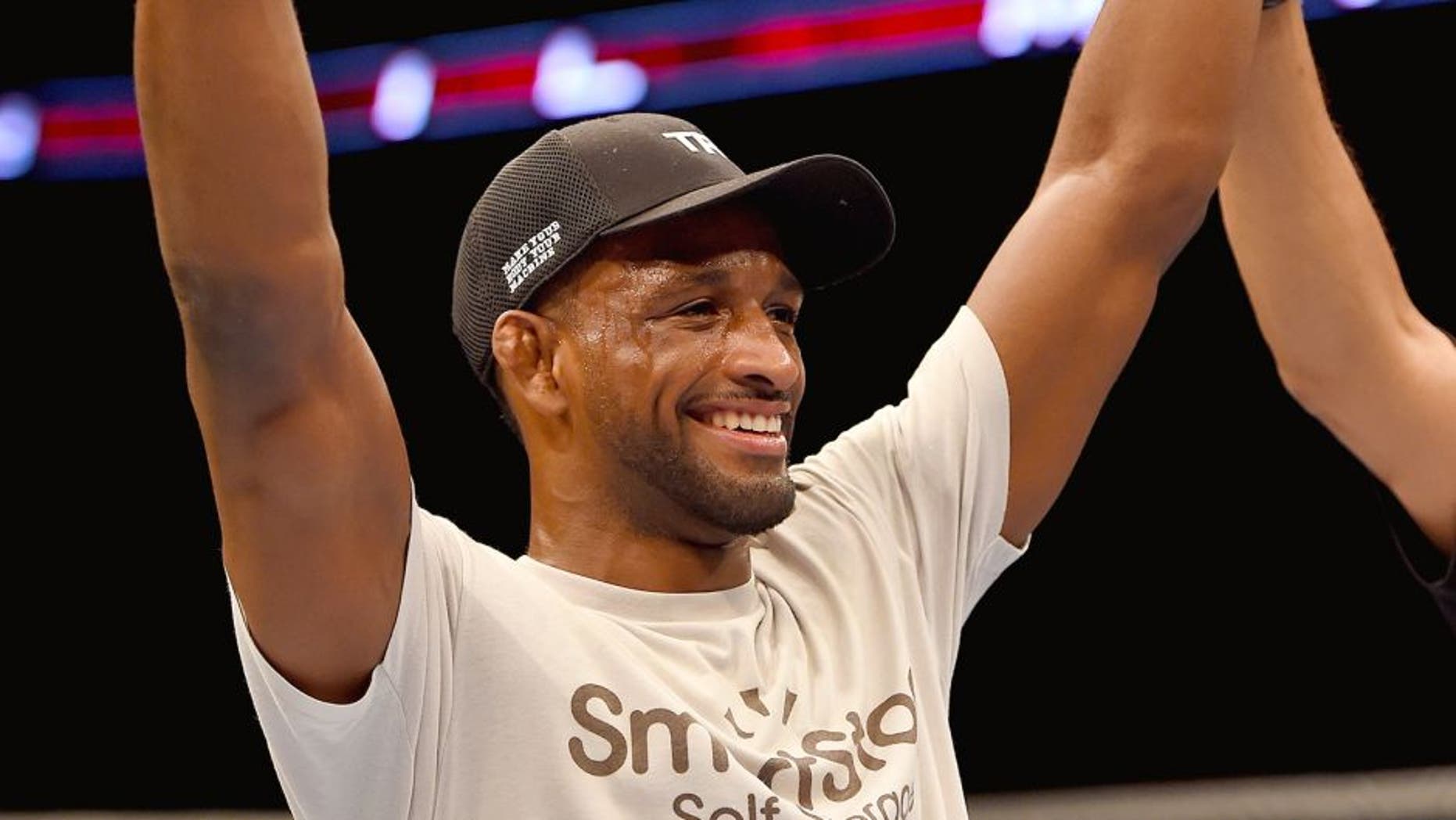 BROOMFIELD, CO - FEBRUARY 14: Neil Magny celebrates after defeating Kiichi Kunimoto by rear naked choke submission in their welterweight fight during the UFC Fight Night event inside 1stBank Center on February 14, 2015 in Broomfield, Colorado. (Photo by Josh Hedges/Zuffa LLC/Zuffa LLC via Getty Images)