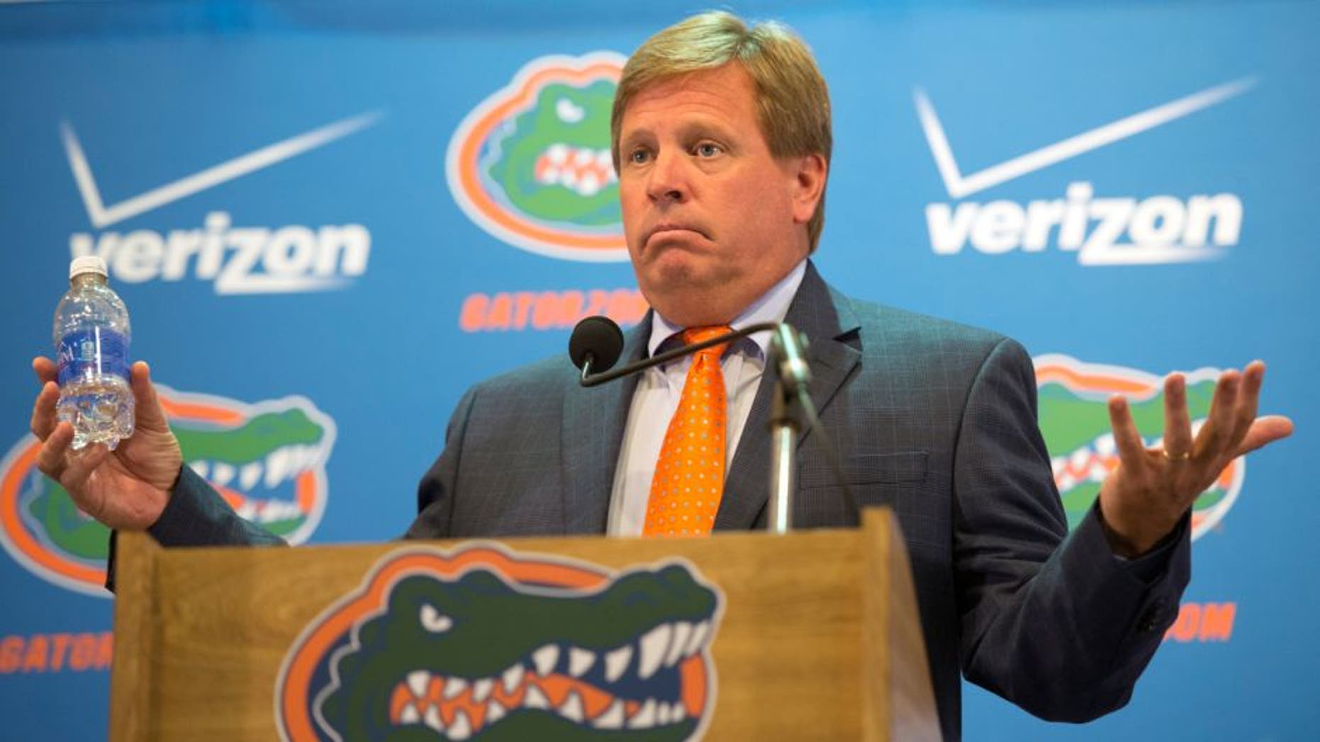 FILE - In this Aug. 5, 2015, file photo, Florida NCAA college football coach Jim McElwain speaks to the media during the teams media day in Gainesville, Fla. McElwain has offered few details about his revamped offense this fall, quite possibly because he knows it could be another long season for the Gators. (AP Photo/Phil Sandlin, File)