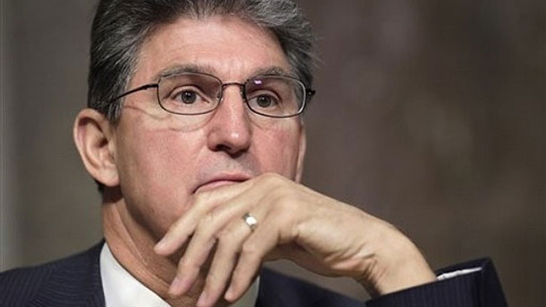 In this March 29, 2011, file photo Senate Armed Services Committee member Sen. Joe Manchin, D-W.Va. listens to testimony on Capitol Hill in Washington.