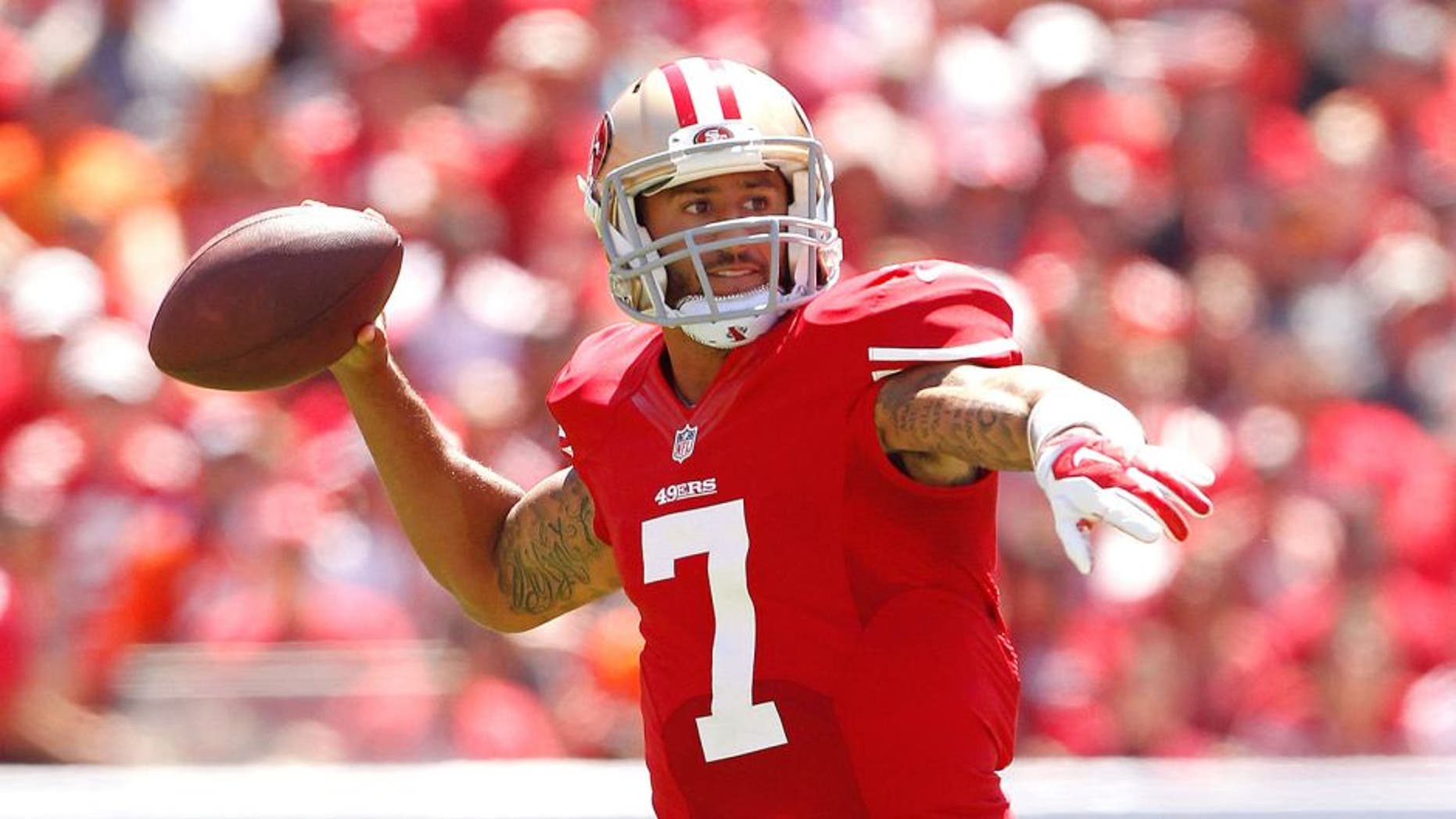 Aug 17, 2014; Santa Clara, CA, USA; San Francisco 49ers quarterback Colin Kaepernick (7) prepares to throw a pass against the Denver Broncos in the first quarter at Levi's Stadium. Mandatory Credit: Cary Edmondson-USA TODAY Sports