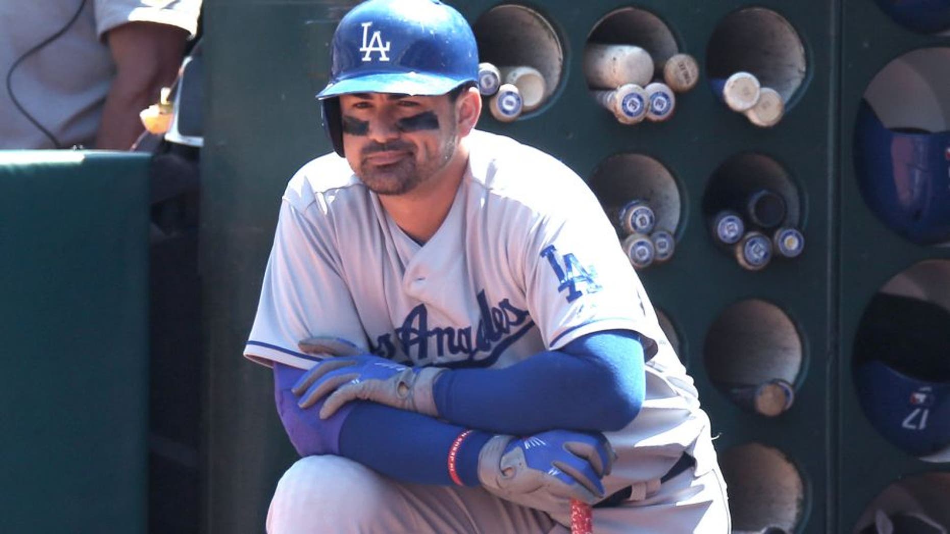OAKLAND, CA - AUGUST 19: Adrian Gonzalez #23 of the Los Angeles Dodgers waits in the dugout for his next at bat against the Oakland Athletics during the game at O.co Coliseum on Wednesday, August 19, 2015 in Oakland, California. (Photo by Brad Mangin/MLB Photos via Getty Images)