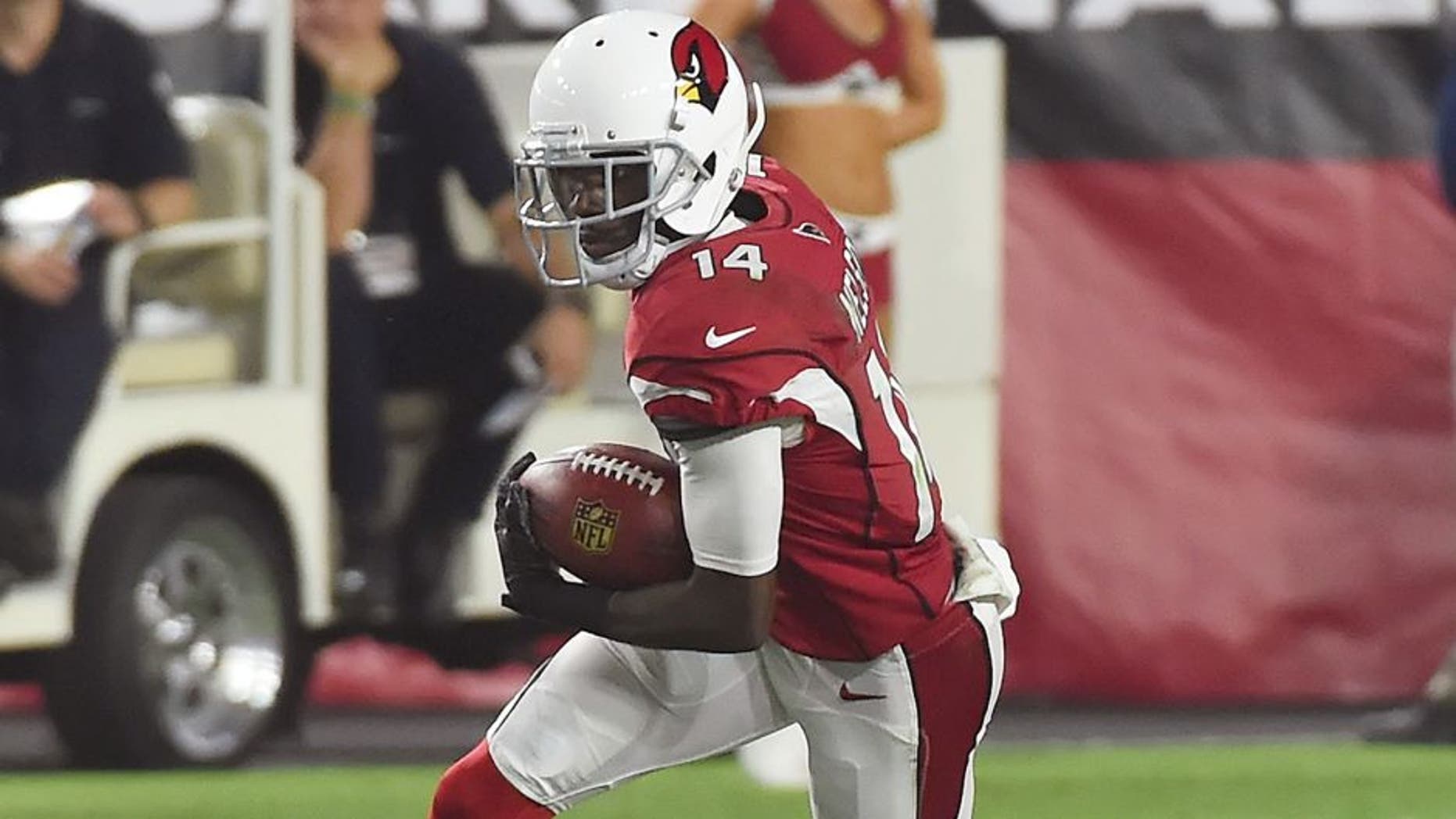 GLENDALE, AZ - AUGUST 22: JJ Nelson #14 of the Arizona Cardinals returns a punt against the San Diego Chargers at University of Phoenix Stadium on August 22, 2015 in Glendale, Arizona. (Photo by Norm Hall/Getty Images)