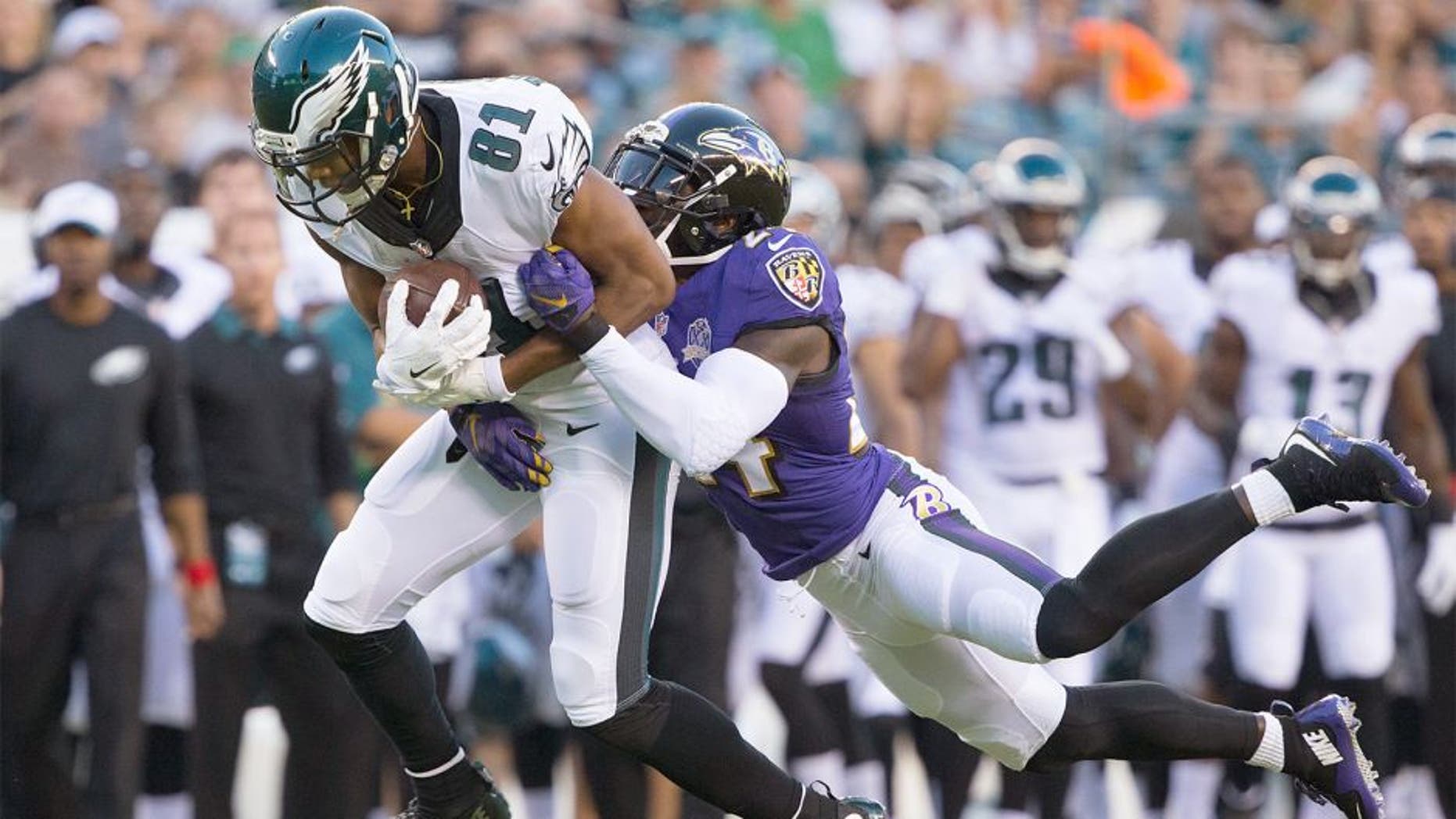 Aug 22, 2015; Philadelphia, PA, USA; Philadelphia Eagles wide receiver Jordan Matthews (81) catches the ball in front of the defense of Baltimore Ravens defensive back Kyle Arrington (24) at Lincoln Financial Field. Mandatory Credit: Bill Streicher-USA TODAY Sports