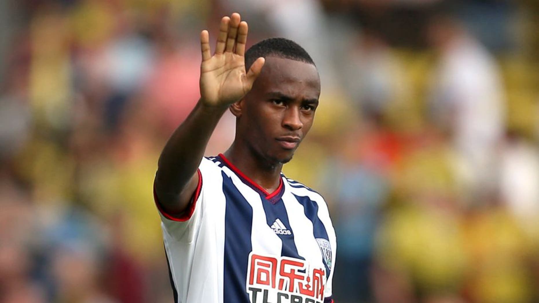 WATFORD, ENGLAND - AUGUST 15: Saido Berahino of West Bromwich Albion waves after the Barclays premier League match between Watford and West Bromwich Albion at Vicarage Road on August 15, 2015 in Watford, England. (Photo by Catherine Ivill - AMA/Getty Images)