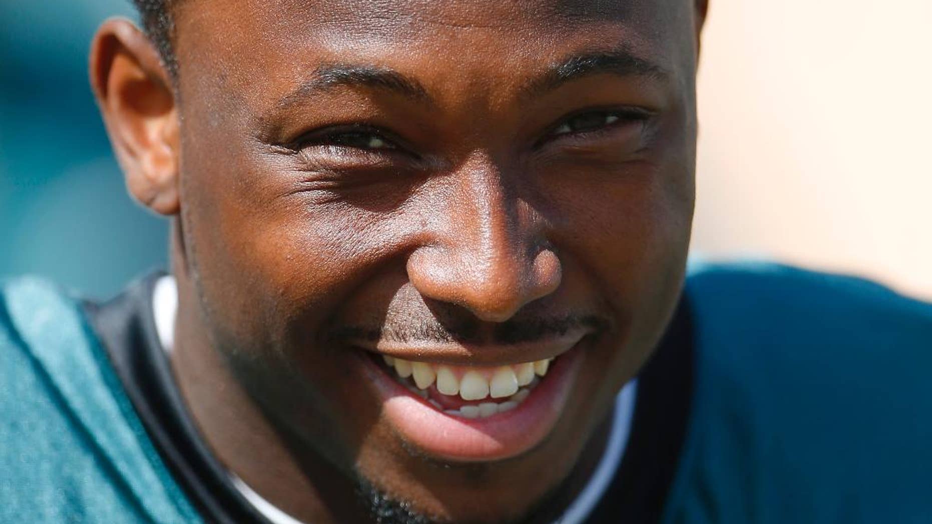 Philadelphia Eagles running back LeSean McCoy goes onto the field for NFL football practice at the team's training facility, Tuesday, Sept. 23, 2014, in Philadelphia. (AP Photo/Matt Rourke)