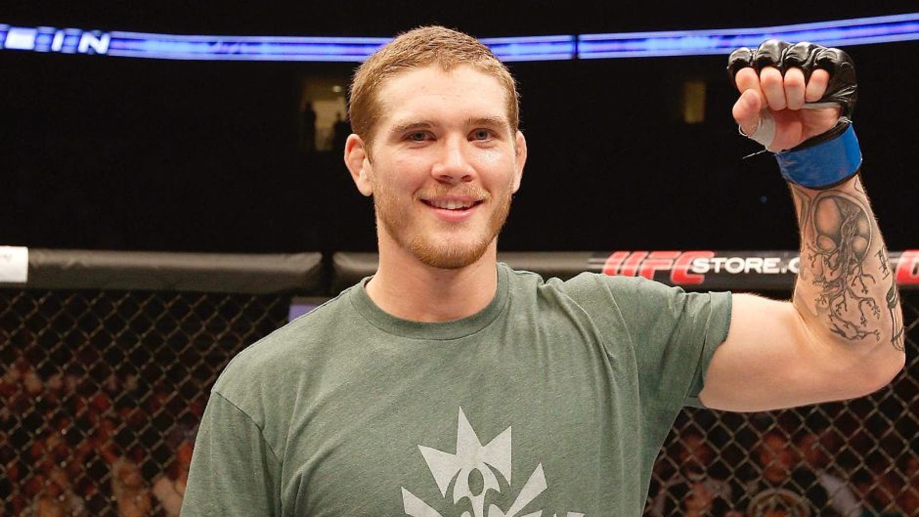 TULSA, OK - AUGUST 23: Jordan Mein of Canada celebrates after his TKO victory over Mike Pyle in their welterweight fight during the UFC Fight Night event at the BOK Center on August 23, 2014 in Tulsa, Oklahoma. (Photo by Josh Hedges/Zuffa LLC/Zuffa LLC via Getty Images)