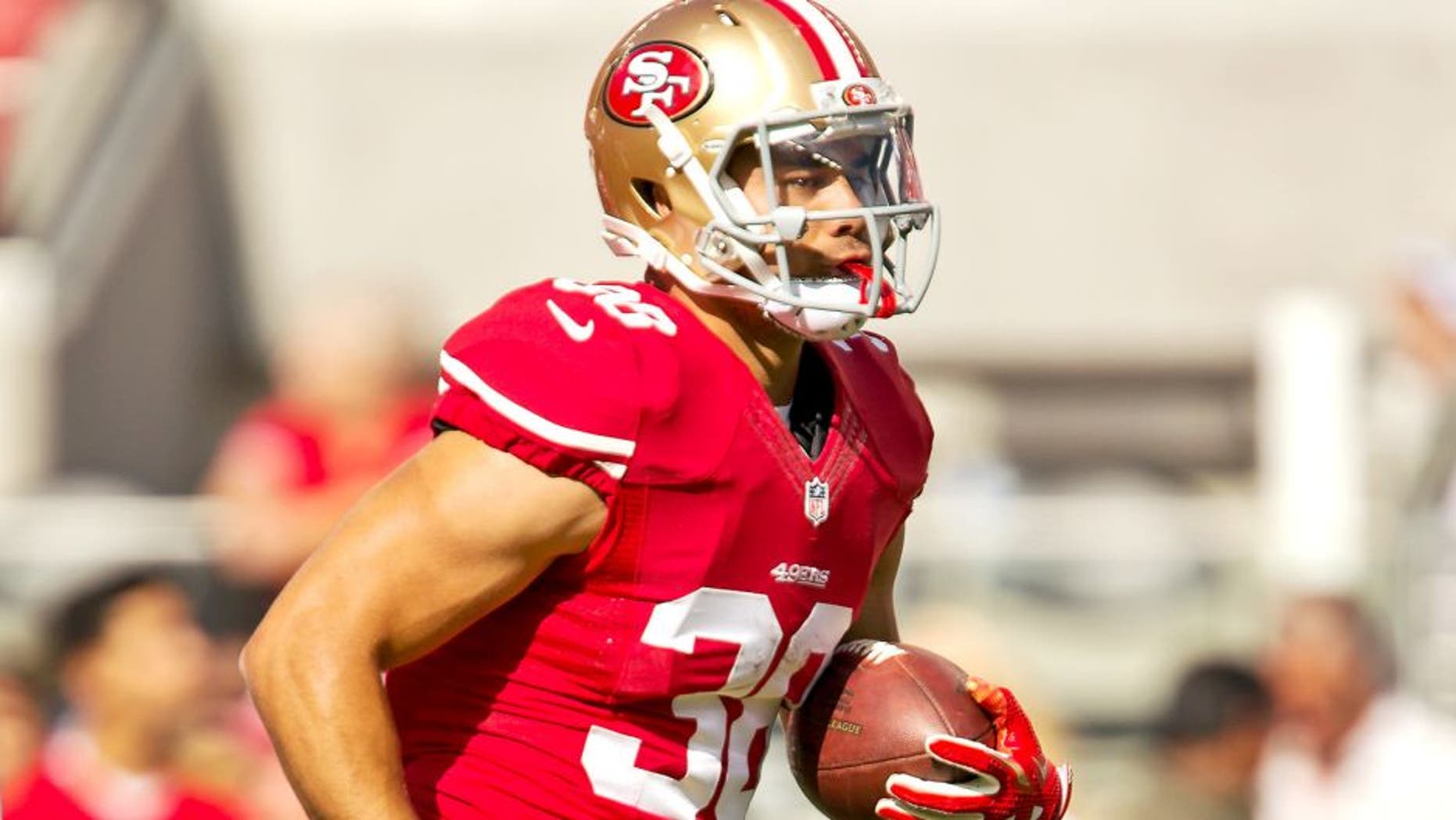 SANTA CLARA, CA - AUGUST 23: Running back Jarryd Hayne #38 of the San Francisco 49ers picks up a step during pregame drills before a preseason game against the Dallas Cowboys on August 23, 2015 at Levi's Stadium in Santa Clara, California. (Photo by Brian Bahr/Getty Images)