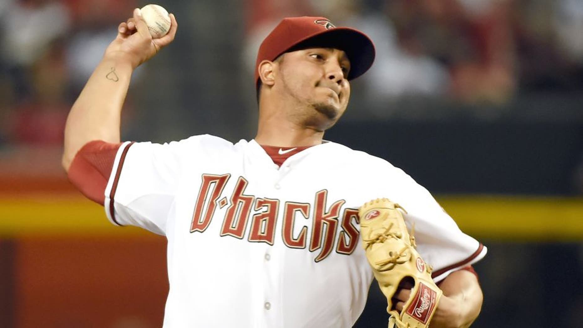 PHOENIX, AZ - AUGUST 24: Jhoulys Chacin #47 of the Arizona Diamondbacks delivers a first inning pitch against the St Louis Cardinals at Chase Field on August 24, 2015 in Phoenix, Arizona. (Photo by Norm Hall/Getty Images)