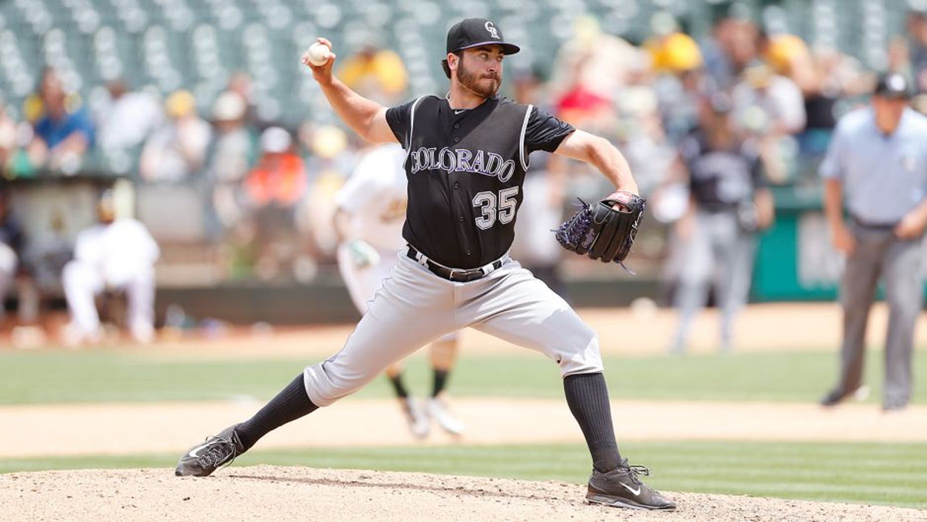 OAKLAND, CA - JULY 1: Chad Bettis #35 of the Colorado Rockies pitches during the game against the Oakland Athletics at O.co Coliseum on July 1, 2015 in Oakland, California. The Athletics defeated the Rockies 4-1. (Photo by Michael Zagaris/Oakland Athletics/Getty Images)