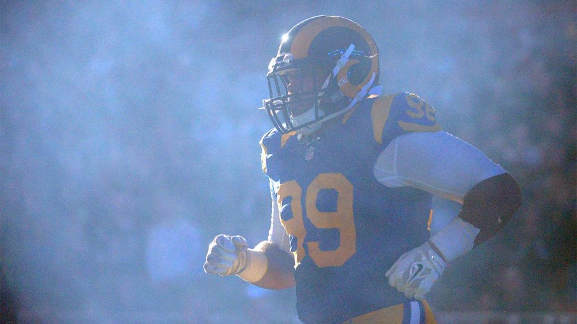 Dec 21, 2014; St. Louis, MO, USA; St. Louis Rams defensive tackle Aaron Donald (99) is introduced prior to a game against the New York Giants at the Edward Jones Dome. Mandatory Credit: Jeff Curry-USA TODAY Sports