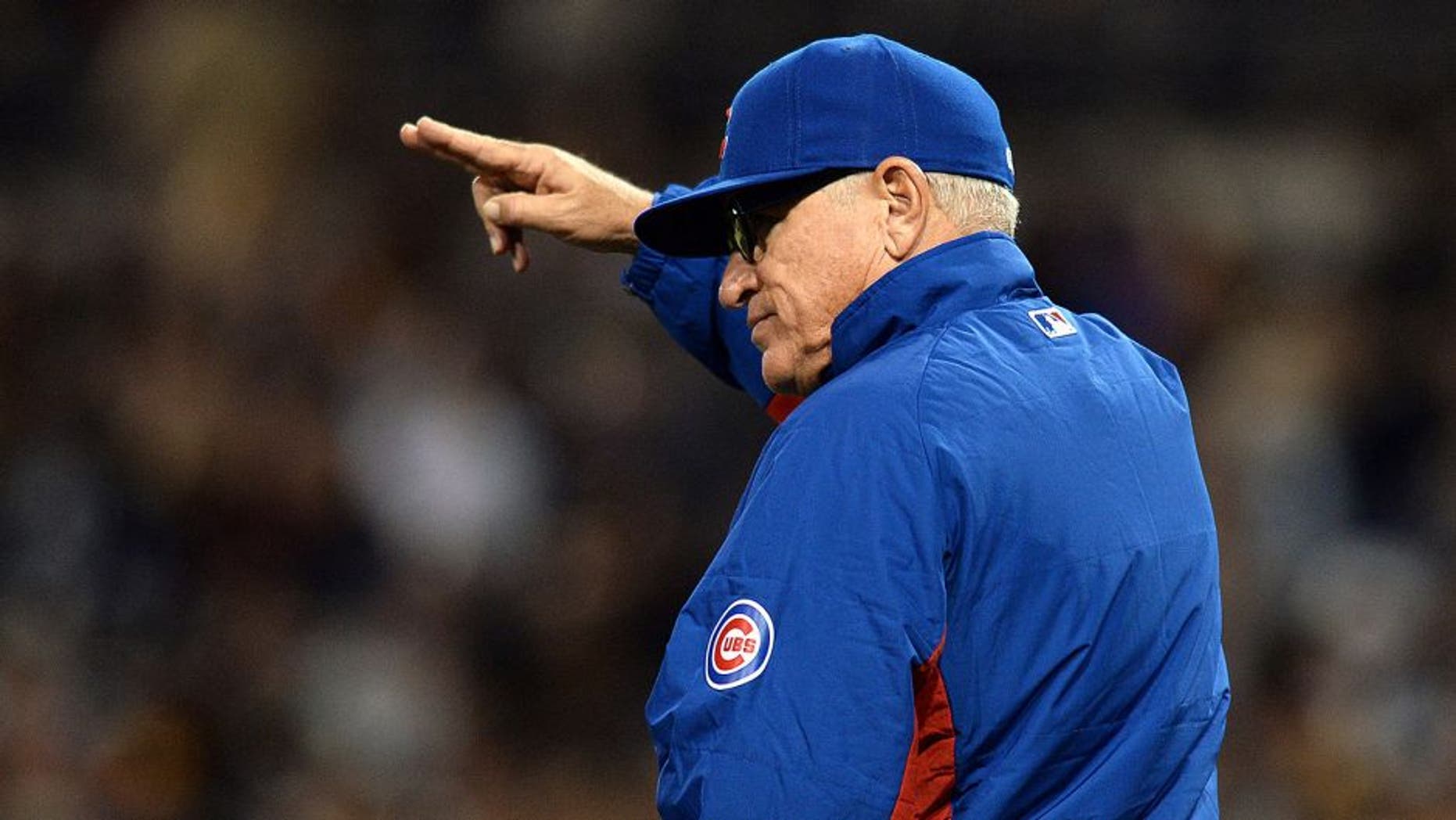May 20, 2015; San Diego, CA, USA; Chicago Cubs manager Joe Maddon (70) gestures to the bullpen in the seventh inning against the San Diego Padres at Petco Park. Mandatory Credit: Jake Roth-USA TODAY Sports
