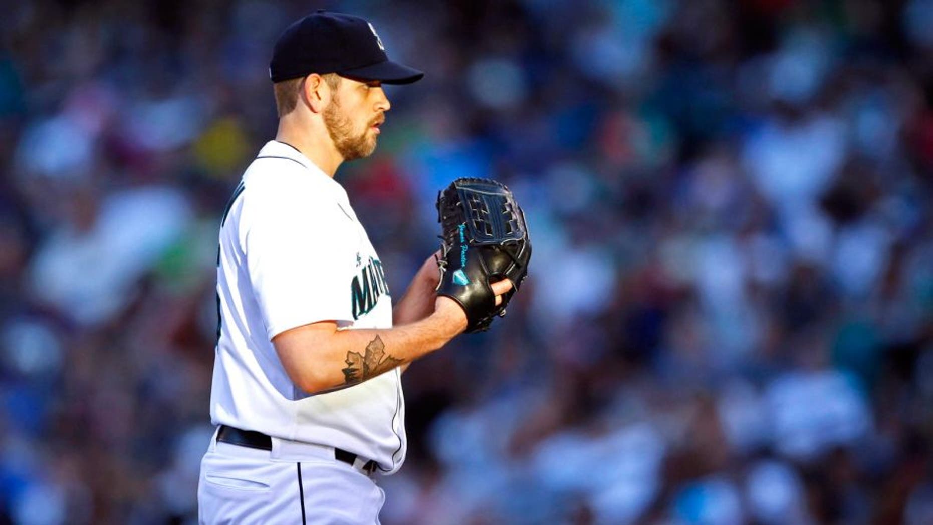 Aug 9, 2014; Seattle, WA, USA; Seattle Mariners pitcher James Paxton (65) stands on the mound against the Chicago White Sox during the sixth inning at Safeco Field. Mandatory Credit: Joe Nicholson-USA TODAY Sports