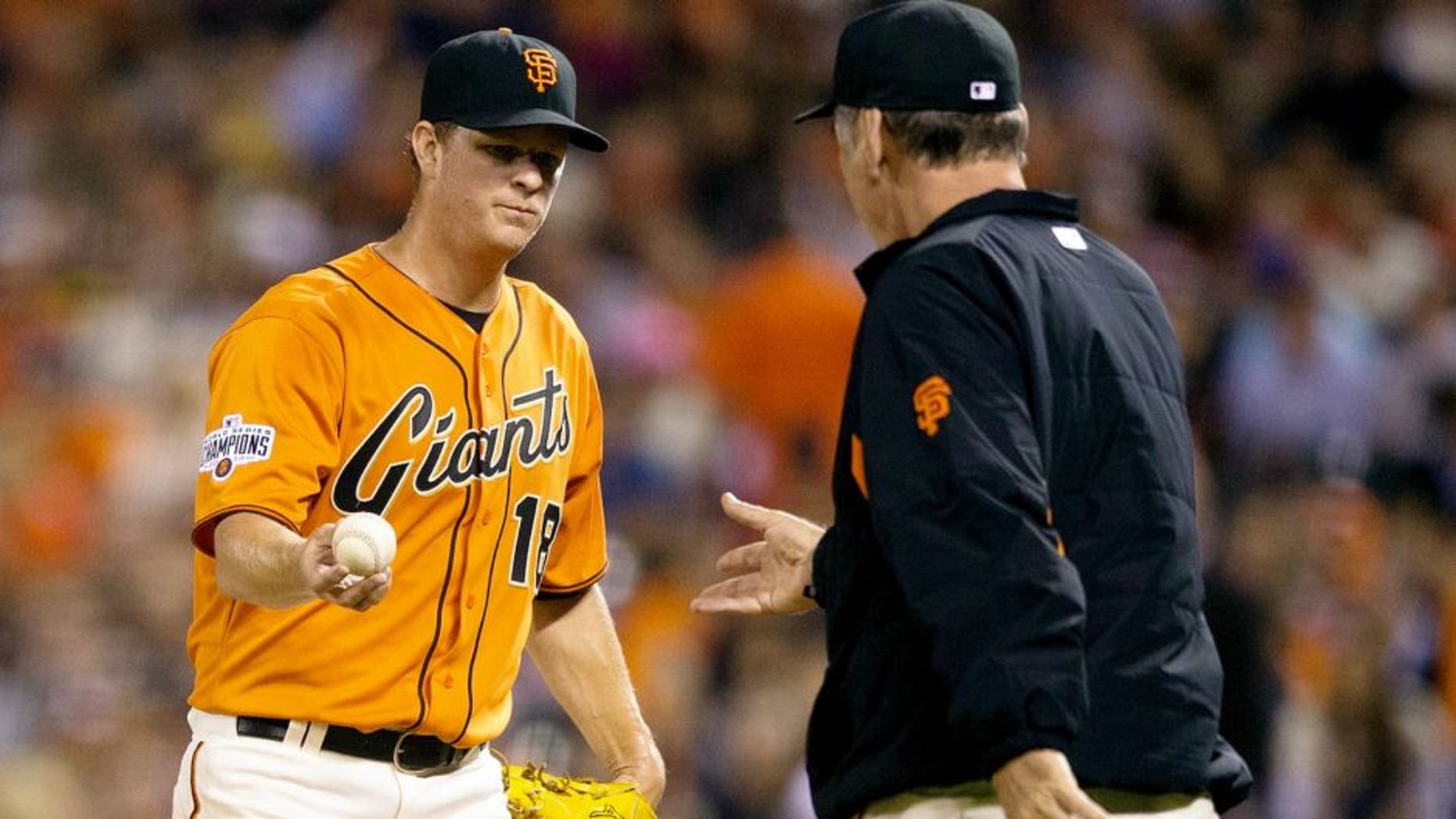 SAN FRANCISCO, CA - AUGUST 14: Matt Cain #18 of the San Francisco Giants is relieved by manager Bruce Bochy #15 during the fifth inning against the Washington Nationals at AT&T Park on August 14, 2015 in San Francisco, California. The San Francisco Giants defeated the Washington Nationals 8-5. (Photo by Jason O. Watson/Getty Images)