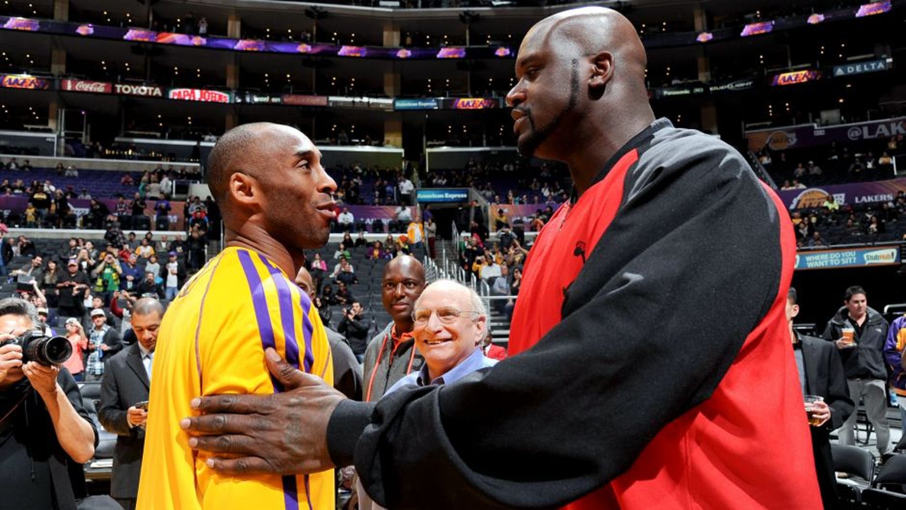 LOS ANGELES, CA - FEBRUARY 12: Former NBA player Shaquille O'Neal greets former teammate Kobe Bryant #24 of the Los Angeles Lakers before a game between the Lakers and the Phoenix Suns at Staples Center on February 12, 2013 in Los Angeles, California. NOTE TO USER: User expressly acknowledges and agrees that, by downloading and/or using this Photograph, user is consenting to the terms and conditions of the Getty Images License Agreement. Mandatory Copyright Notice: Copyright 2013 NBAE (Photo by Andrew D. Bernstein/NBAE via Getty Images)