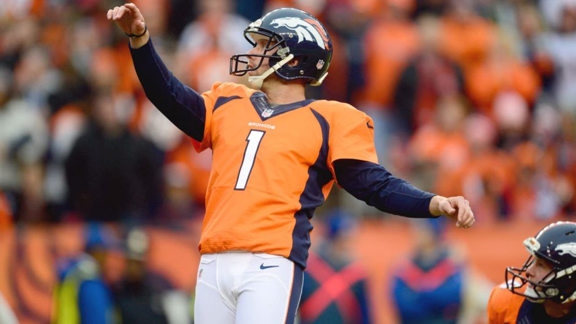 Jan 11, 2015; Denver, CO, USA; Denver Broncos kicker Connor Barth (1) completes a point after in the second quarter of the 2014 AFC Divisional playoff football game against the Indianapolis Colts at Sports Authority Field at Mile High. Mandatory Credit: Ron Chenoy-USA TODAY Sports