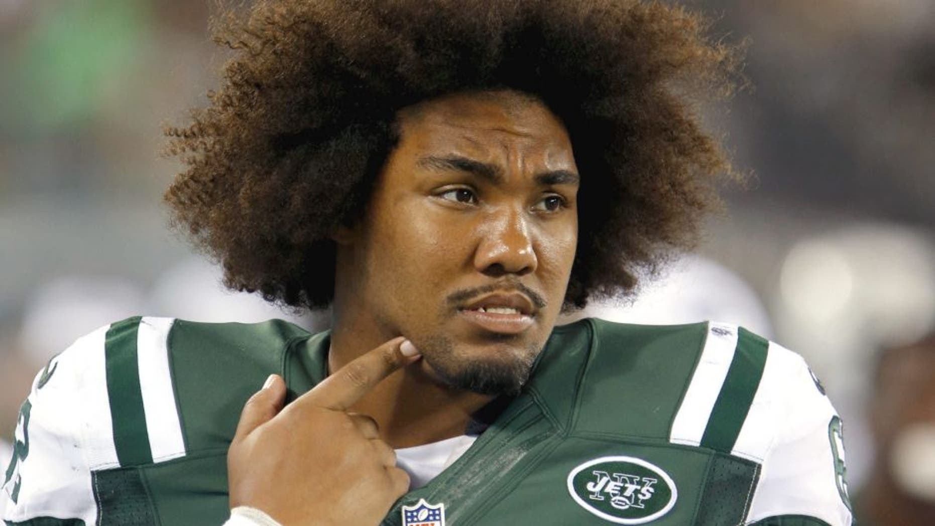 Aug 21, 2015; East Rutherford, NJ, USA; New York Jets defensive tackle Leonard Williams (62) watches game against the Atlanta Falcons from sidelines during second half at MetLife Stadium. Mandatory Credit: Noah K. Murray-USA TODAY Sports