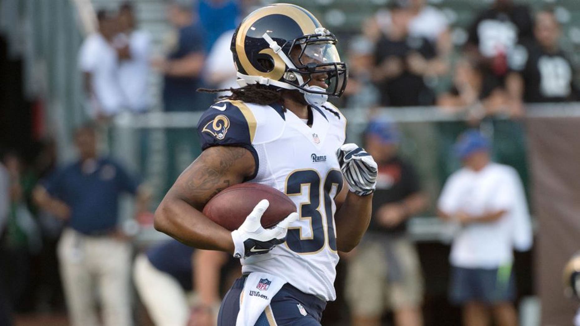 August 14, 2015; Oakland, CA, USA; St. Louis Rams running back Todd Gurley (30) warms up before a preseason NFL football game against the Oakland Raiders at O.co Coliseum. The Raiders defeated the Rams 18-3. Mandatory Credit: Kyle Terada-USA TODAY Sports