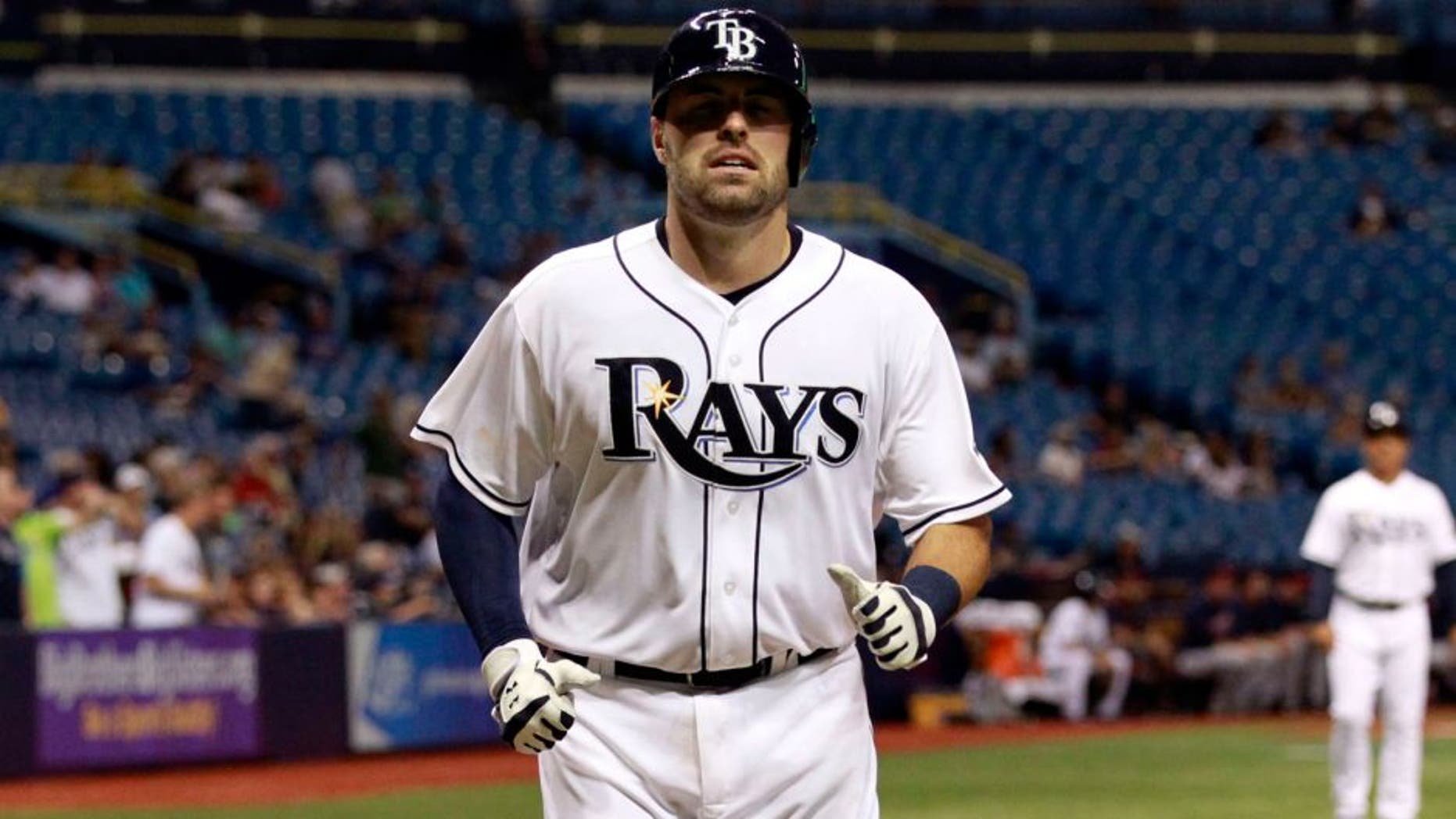 Aug 25, 2015; St. Petersburg, FL, USA; Tampa Bay Rays catcher Curt Casali (19) scores a run during the sixth inning against the against the Minnesota Twins at Tropicana Field. Mandatory Credit: Kim Klement-USA TODAY Sports