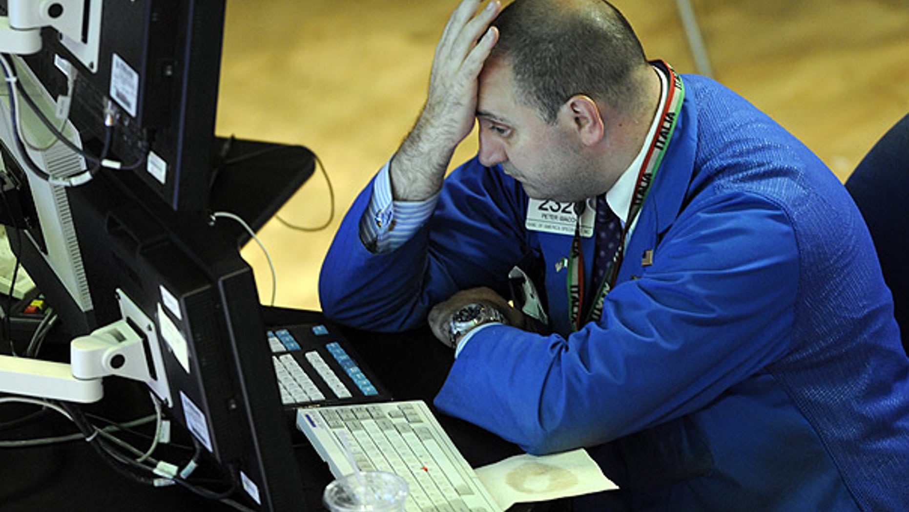 Aug. 19: Bank of America Specialist Peter Giacchi reacts on the floor of the New York Stock Exchange.