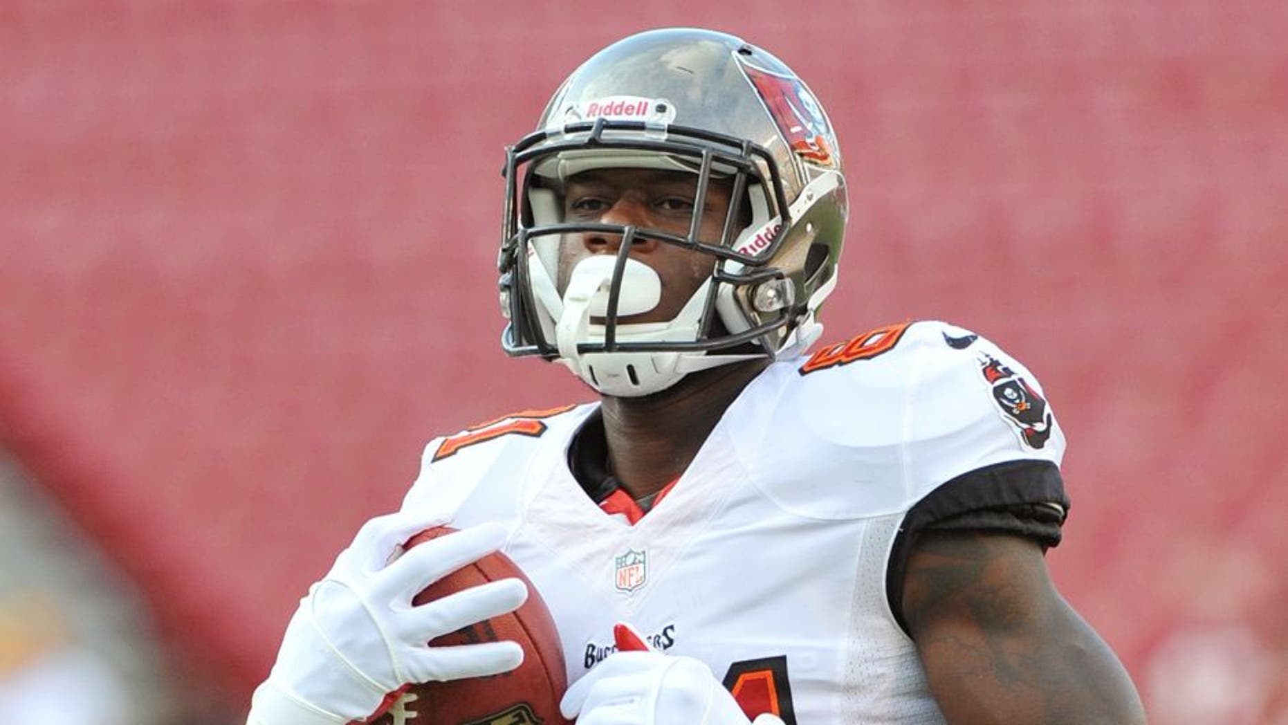 TAMPA, FL - AUGUST 29: Tight end Tim Wright #81 of the Tampa Bay Buccaneers warms up for play against the Washington Redskins August 29, 2013 at Raymond James Stadium in Tampa, Florida. (Photo by Al Messerschmidt/Getty Images)