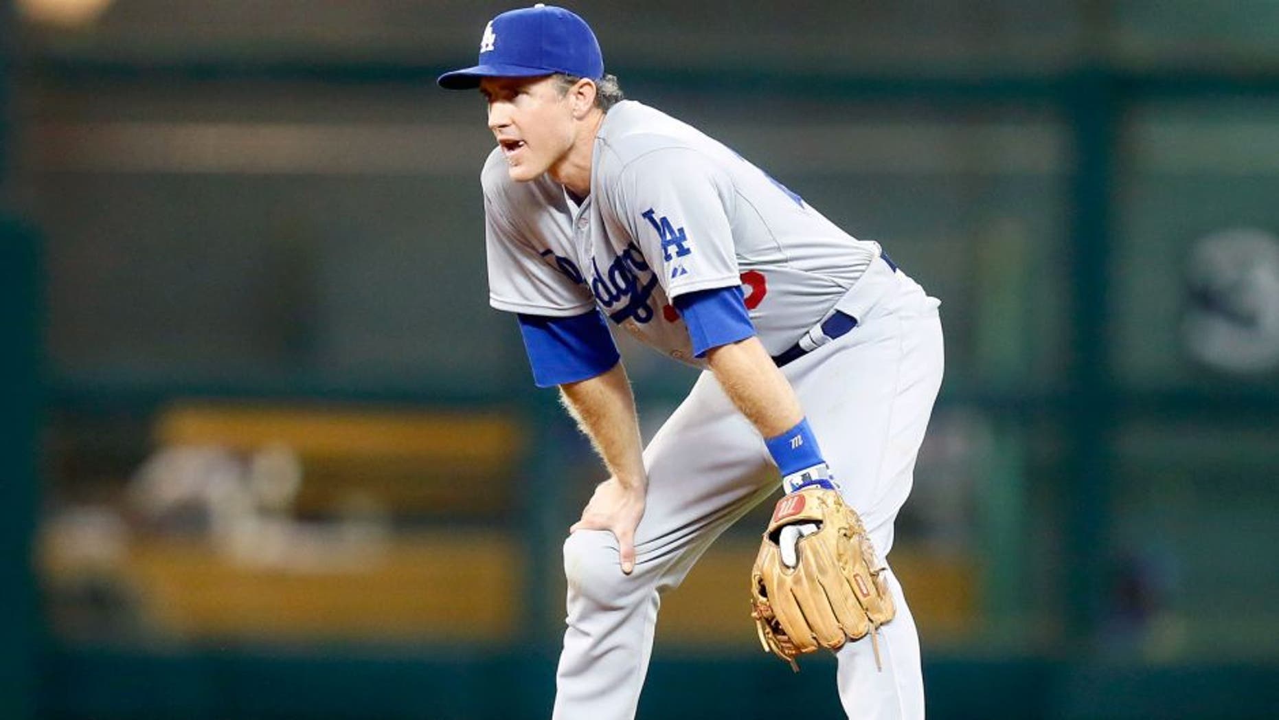HOUSTON, TX - AUGUST 22: Chase Utley #26 of the Los Angeles Dodgers during game action against the Houston Astros at Minute Maid Park on August 22, 2015 in Houston, Texas. (Photo by Bob Levey/Getty Images)